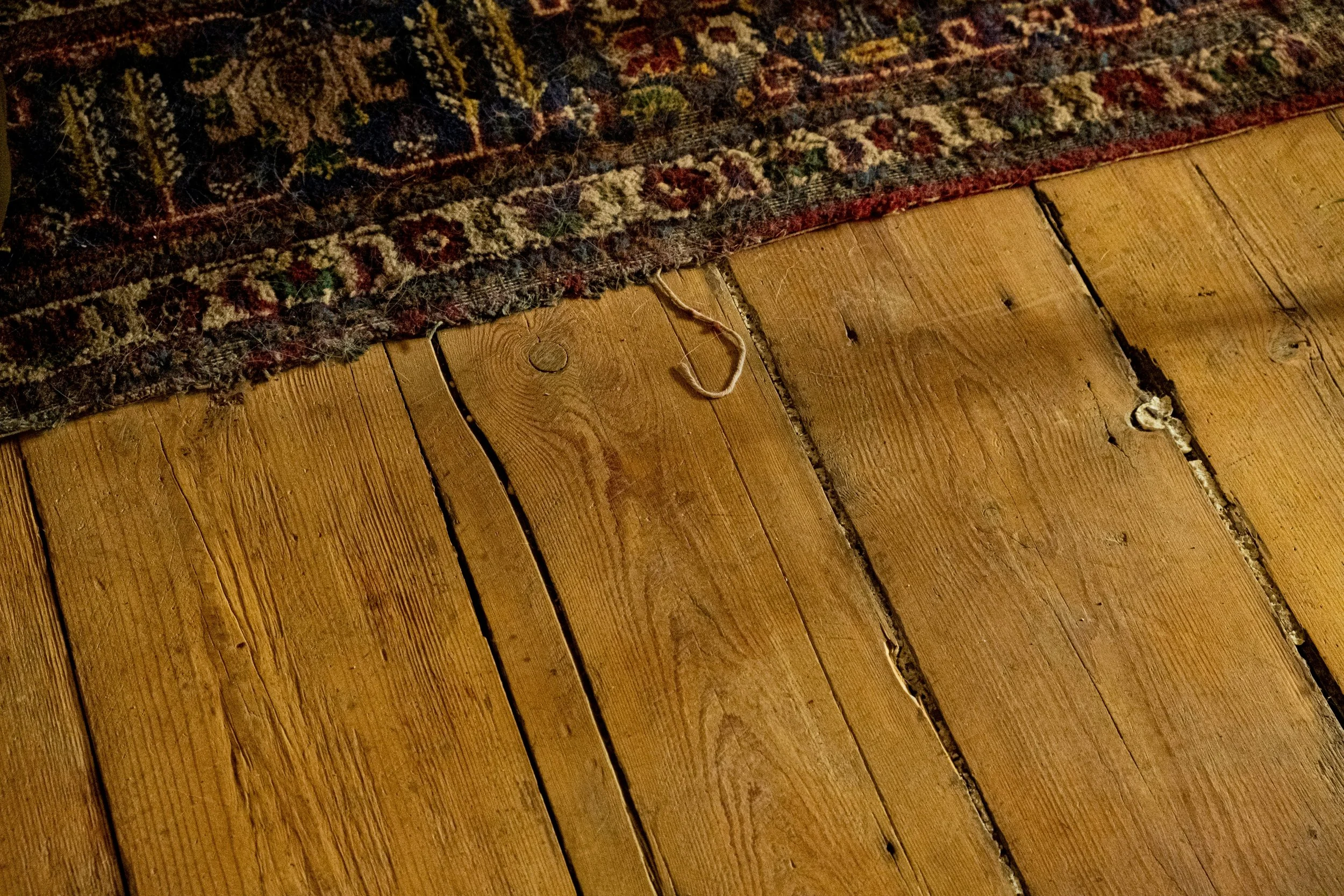 hardwood floor gaps and damage from low indoor humidity and dry air in Orange County home