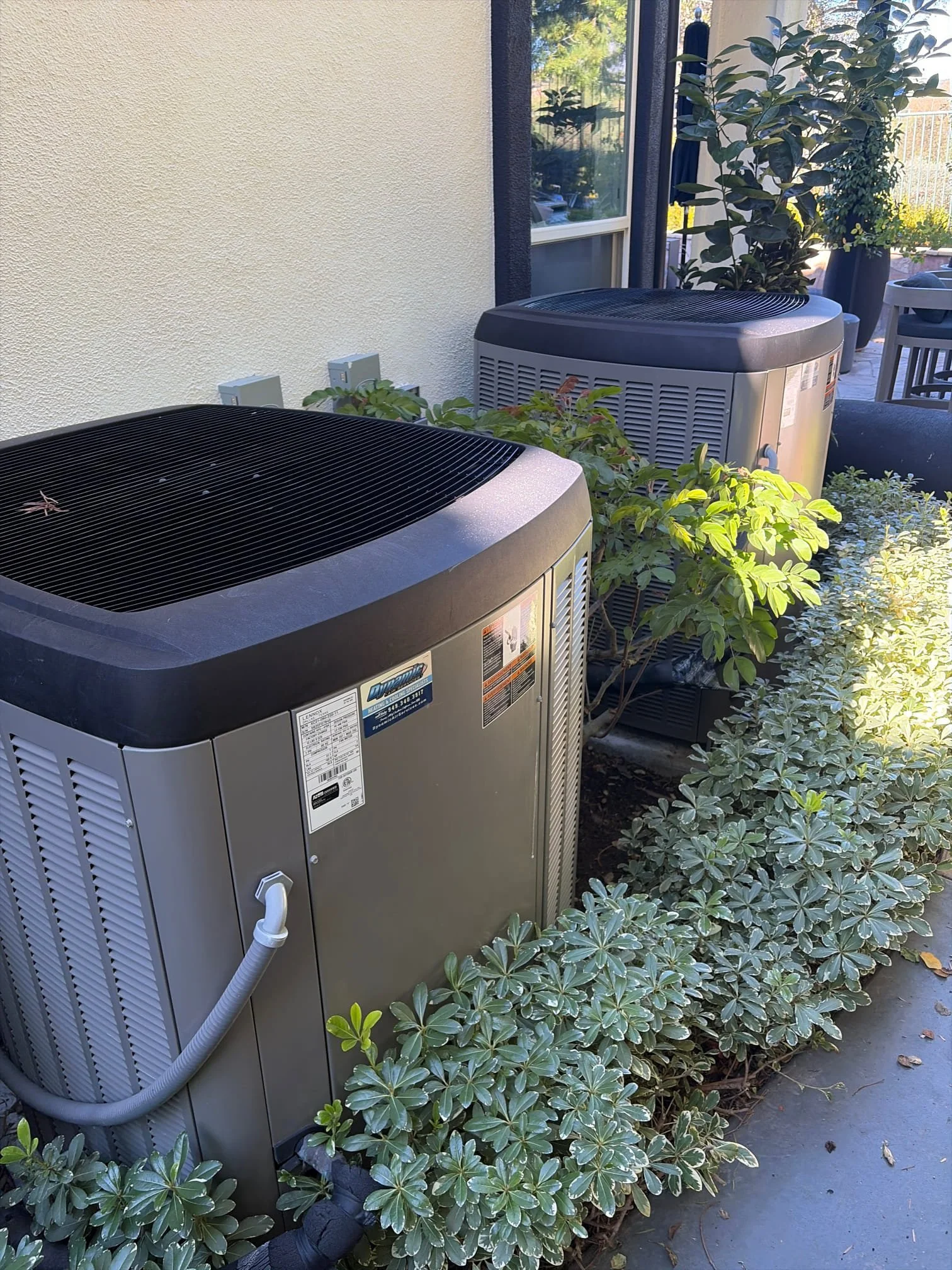 two R-410A air conditioning condensers at Orange County residential property