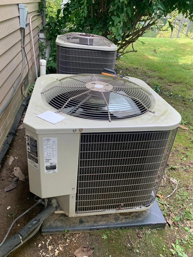 Outdoor AC condenser unit during spring air conditioner maintenance in Yorba Linda home
