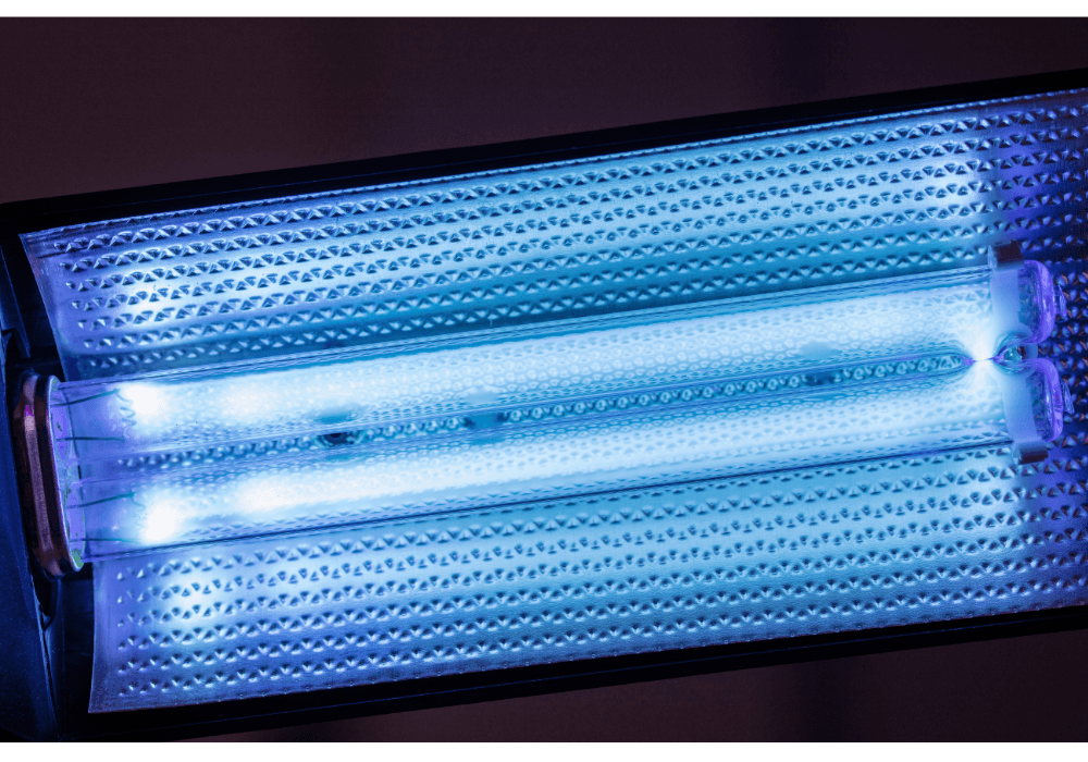UV HVAC germicidal light installed inside air handler to eliminate mold, mildew, and bacteria on the evaporator coil