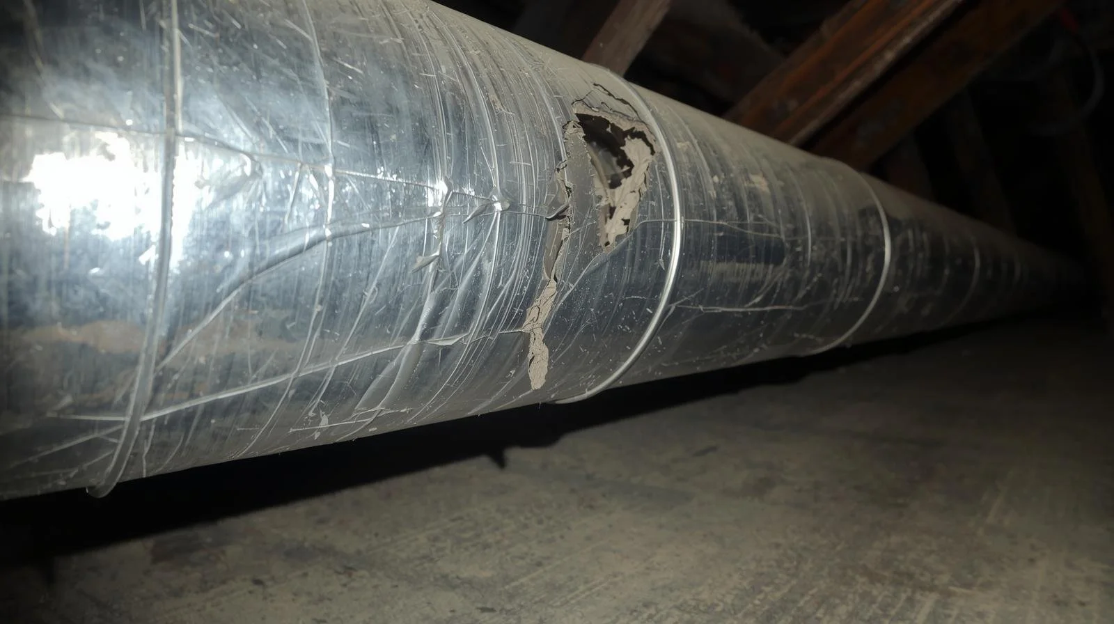 damaged leaking HVAC ductwork in Orange County attic causing energy loss