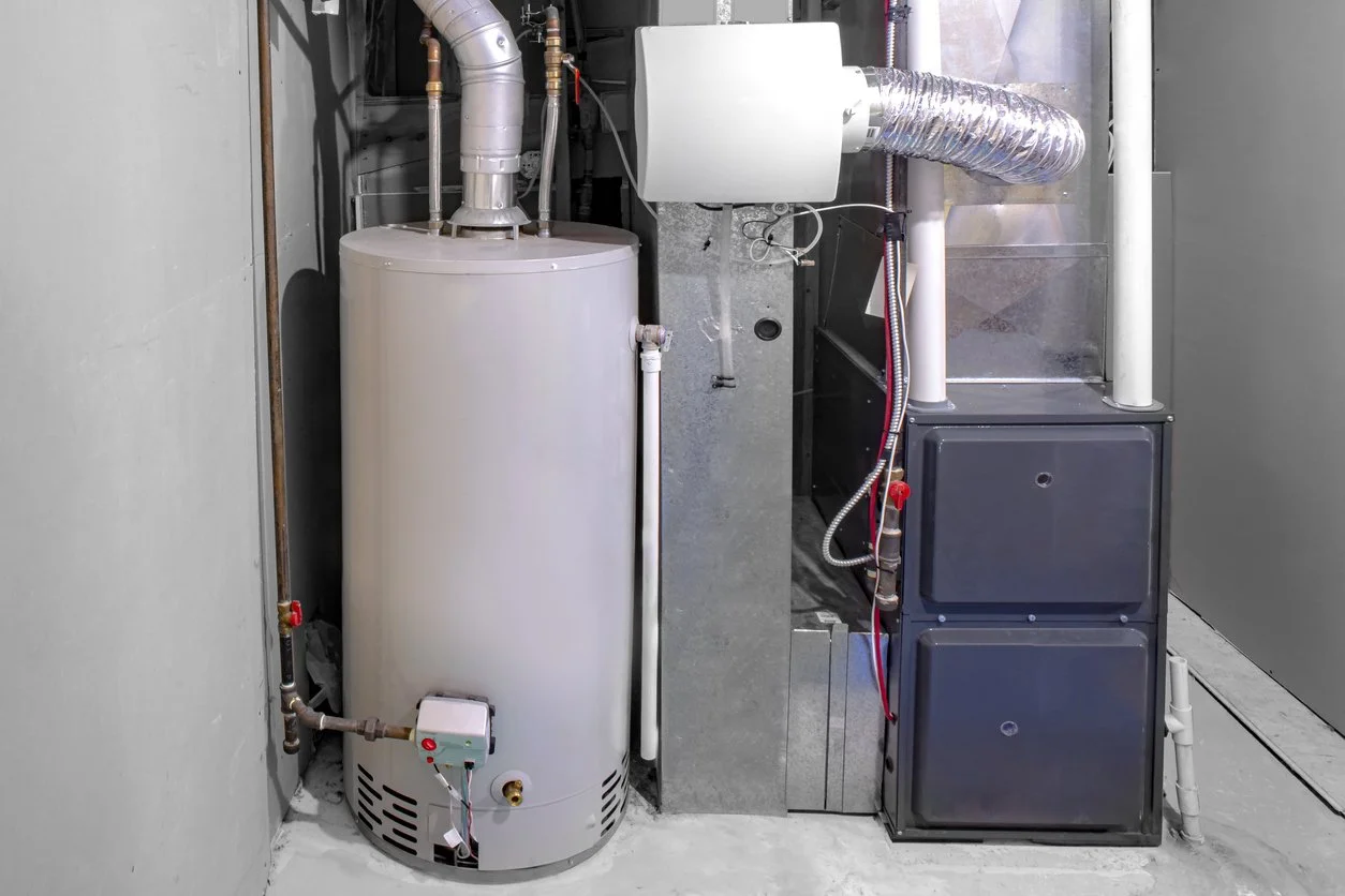 residential gas furnace and water heater installed in a Yorba Linda home utility closet