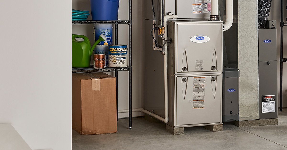 Carrier high-efficiency gas furnace and air handler installed in an Orange County home
