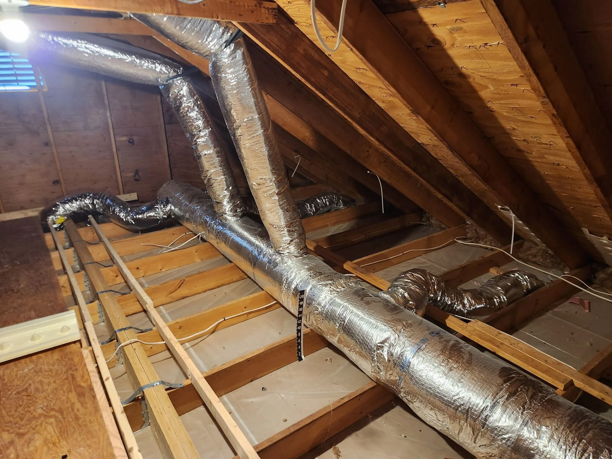 attic ductwork for whole house fan system with insulated ventilation ducts