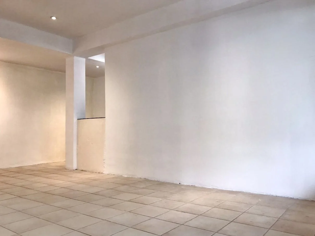 Open-plan commercial retail space with tiled floors in Santa Teresa, Costa Rica