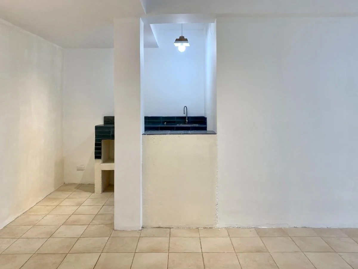 Tiled floor and open interior layout of commercial property in Playa Carmen