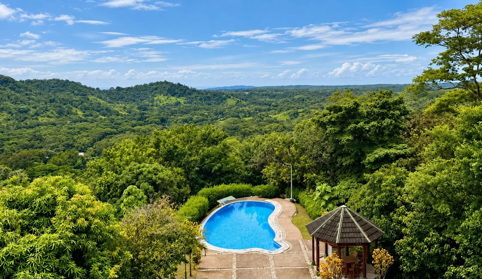 Private swimming pool with panoramic tropical jungle views at Finca Pamela in Tambor, Costa Rica