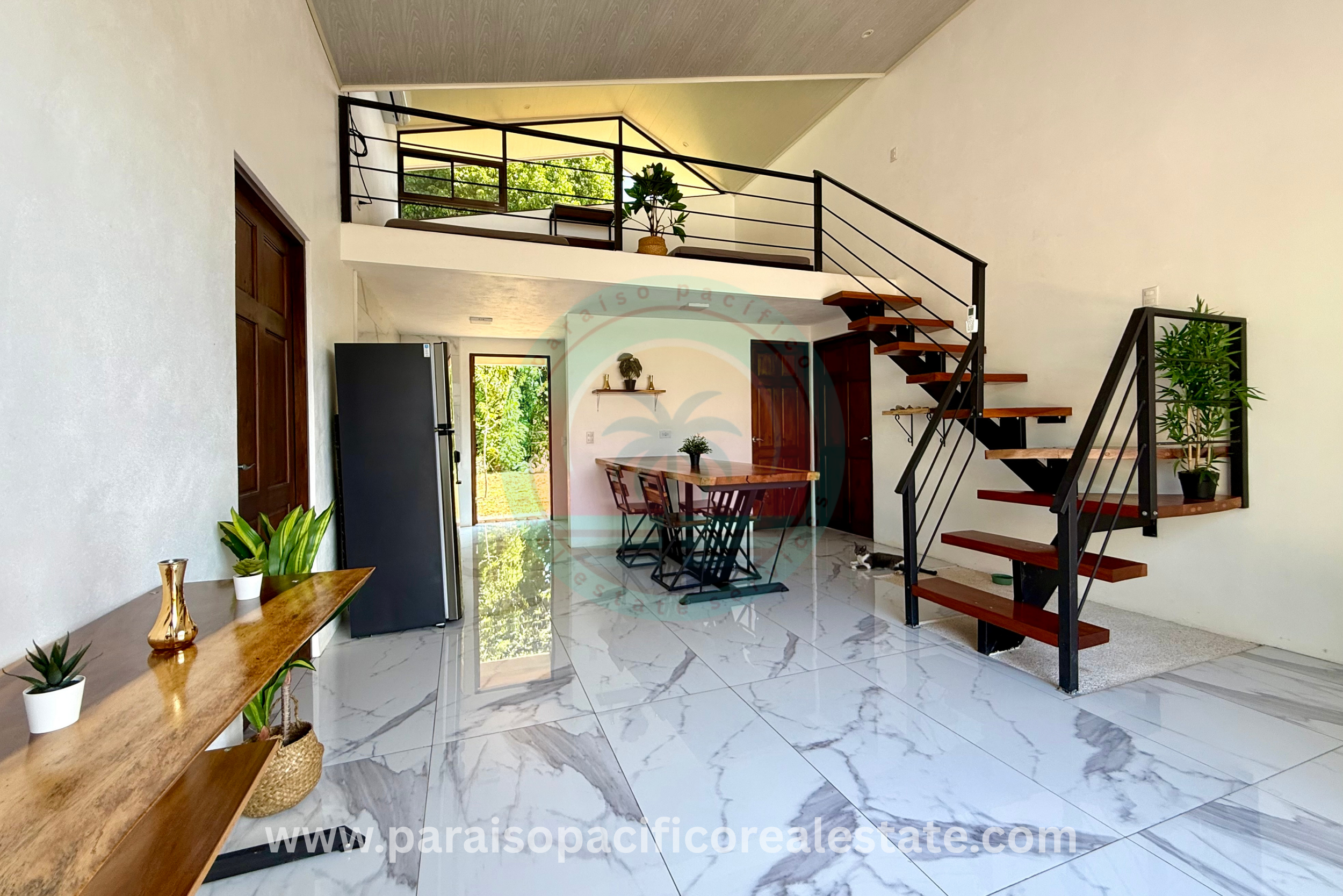 Modern House of Santa Fe of Cobano Costa Rica Stairs to loft view 2.png