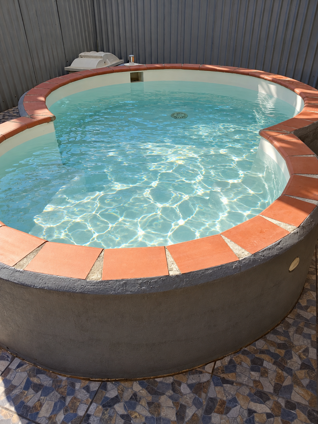 Private plunge pool with terracotta tile edging at Casa Palma Bonita near Santa Teresa