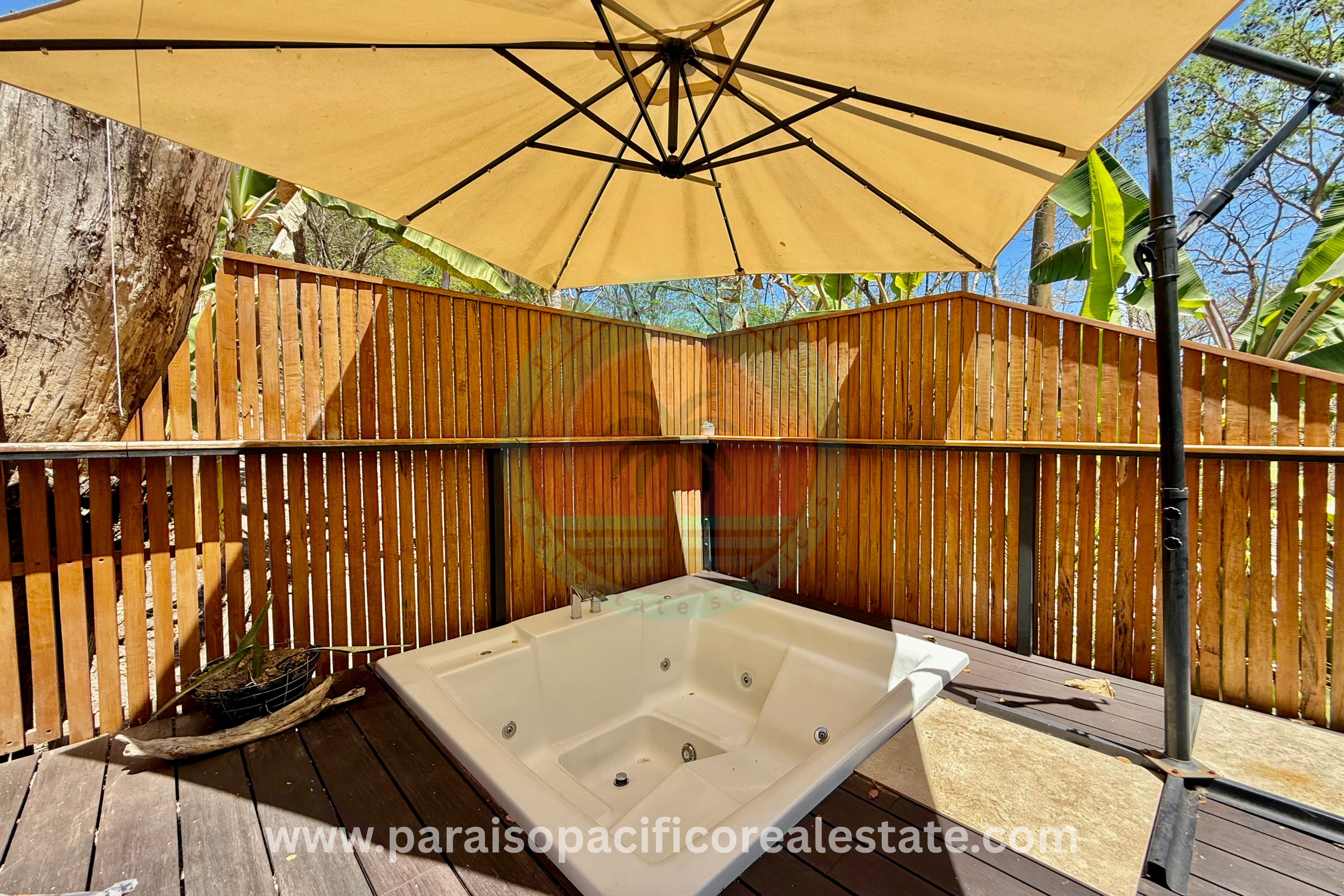 Outdoor jacuzzi on patio at Buddha House Organos near the beach in Costa Rica