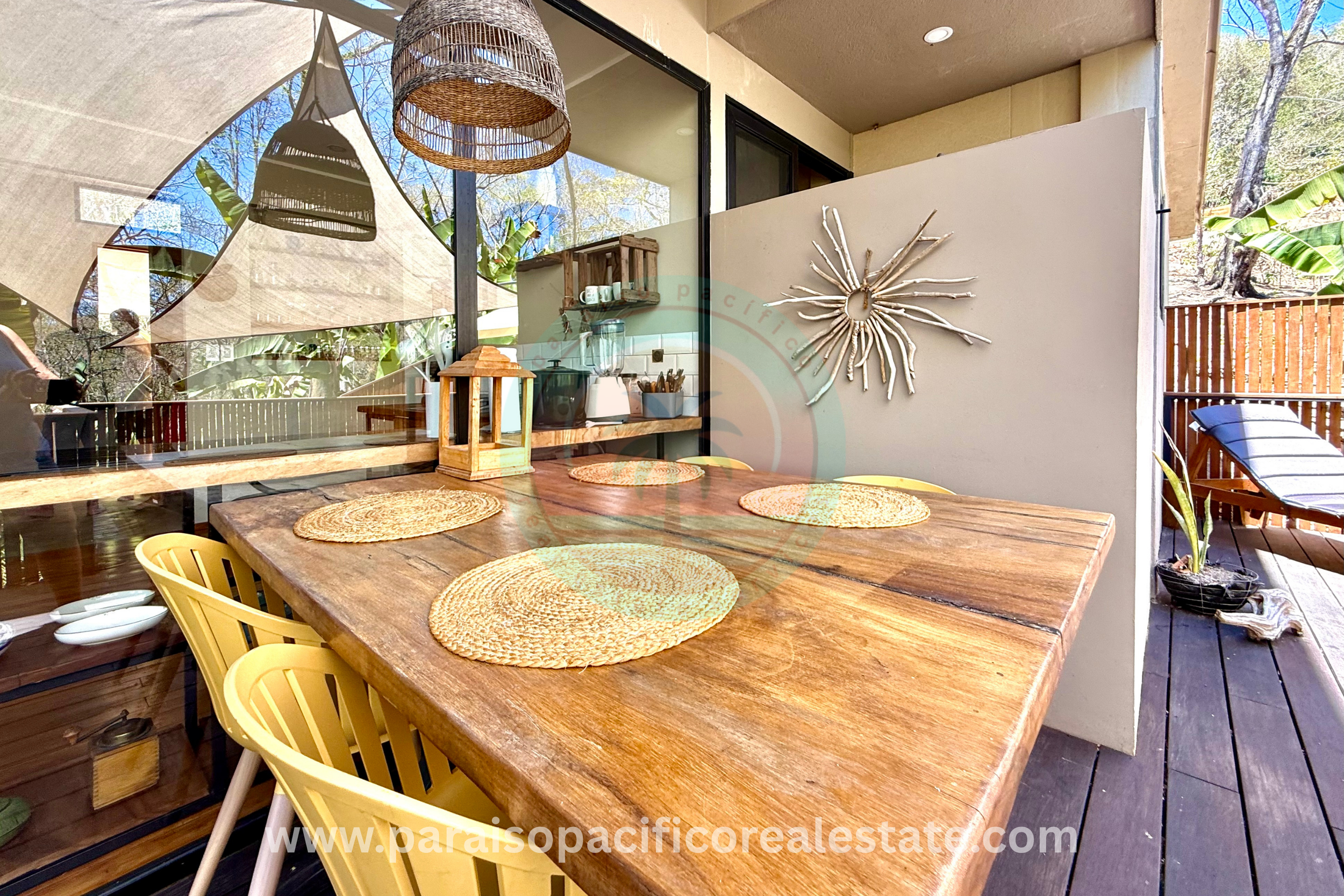 Outdoor patio dining area at Buddha House Organos near the beach in Costa Rica