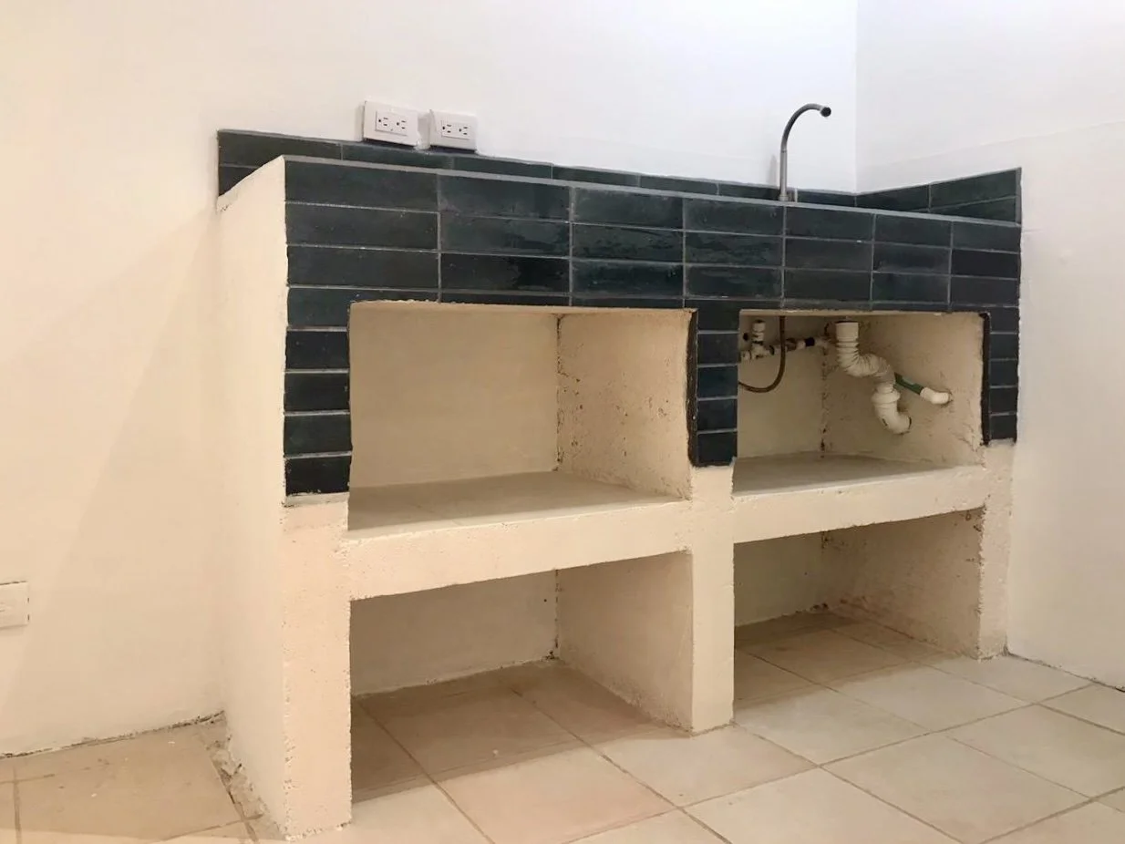 Built-in counter and sink area inside Santa Teresa commercial retail unit