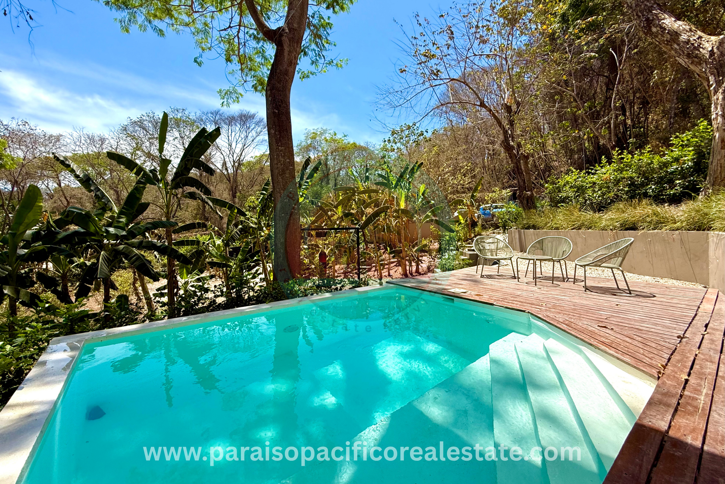 Outdoor pool and patio at Buddha House Organos near the beach in Costa Rica