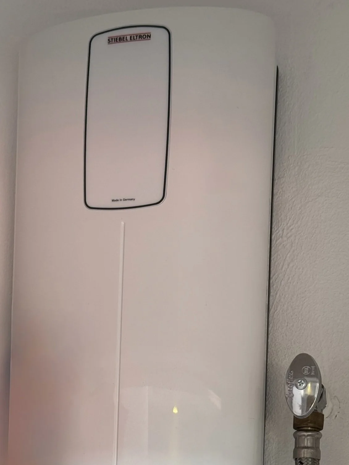 NEW Hot water on demand system allows for hot water in kitchen, washroom, and shower
