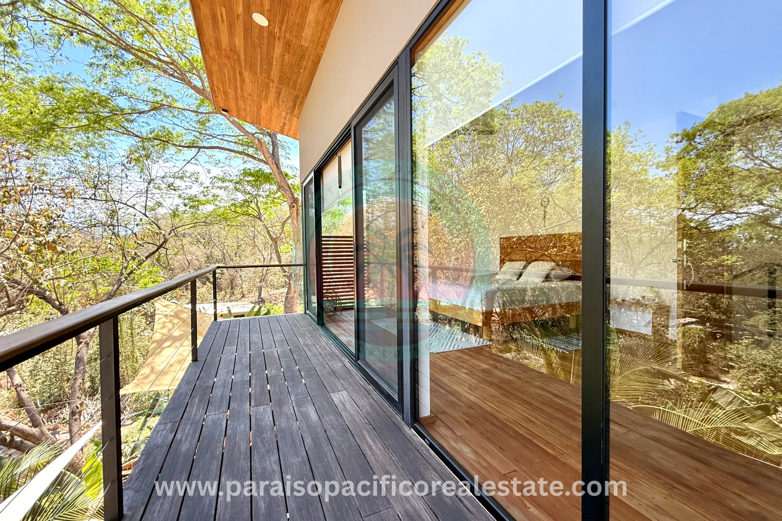 Bedroom one with view  outdoor patio at Buddha House Organos near the beach in Costa Rica