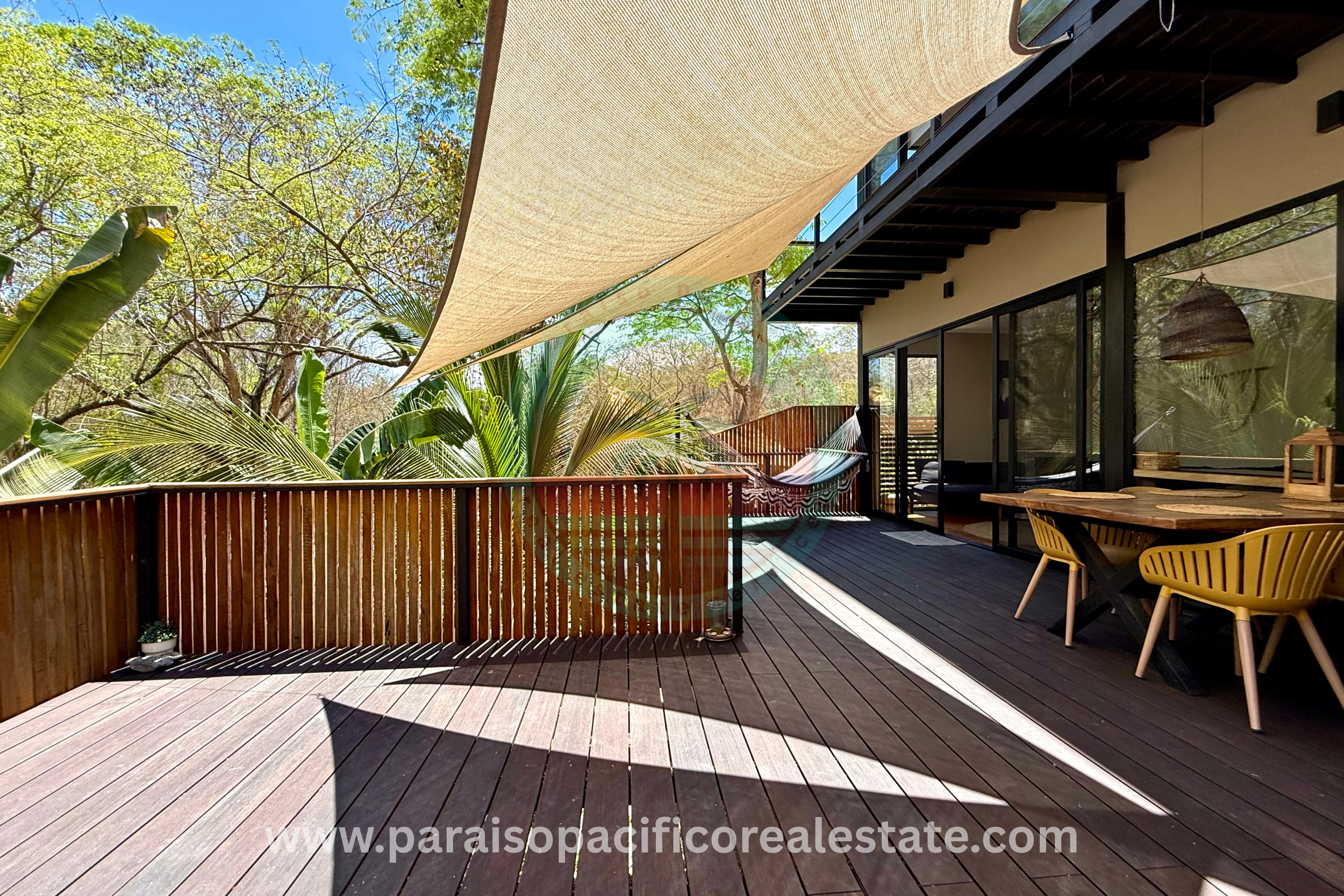 Outdoor patio dining area at Buddha House Organos near the beach in Costa Rica