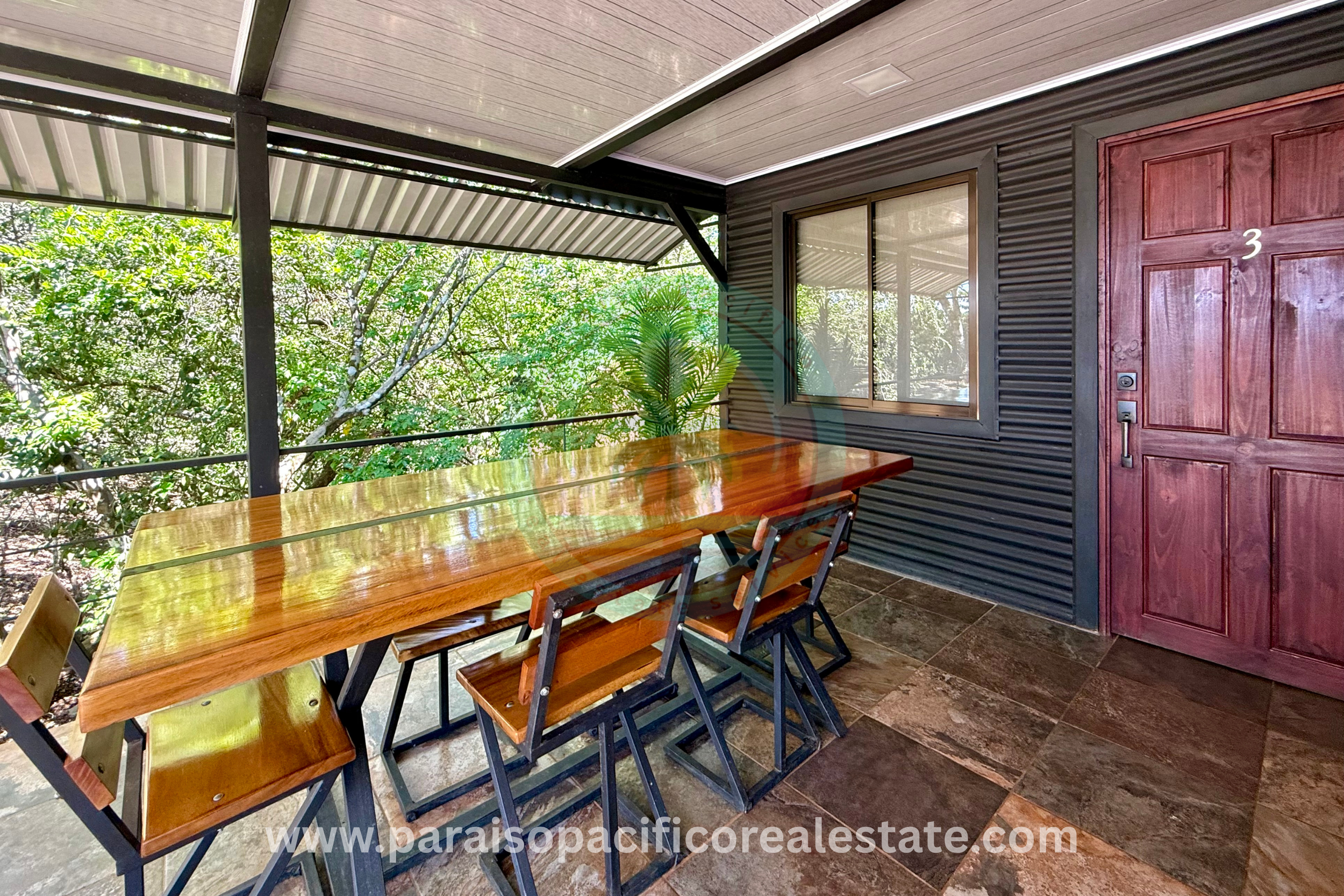 Pyramid View house Santa Fe of Cobano Costa Rica main floor table patio.png