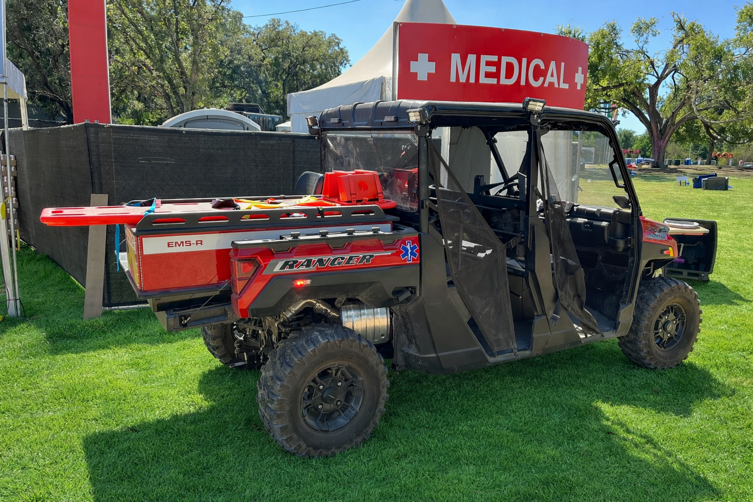 Medical UTV operated by event EMTs and paramedics providing rapid patient transport and first aid coverage at a large festival in Central Texas
