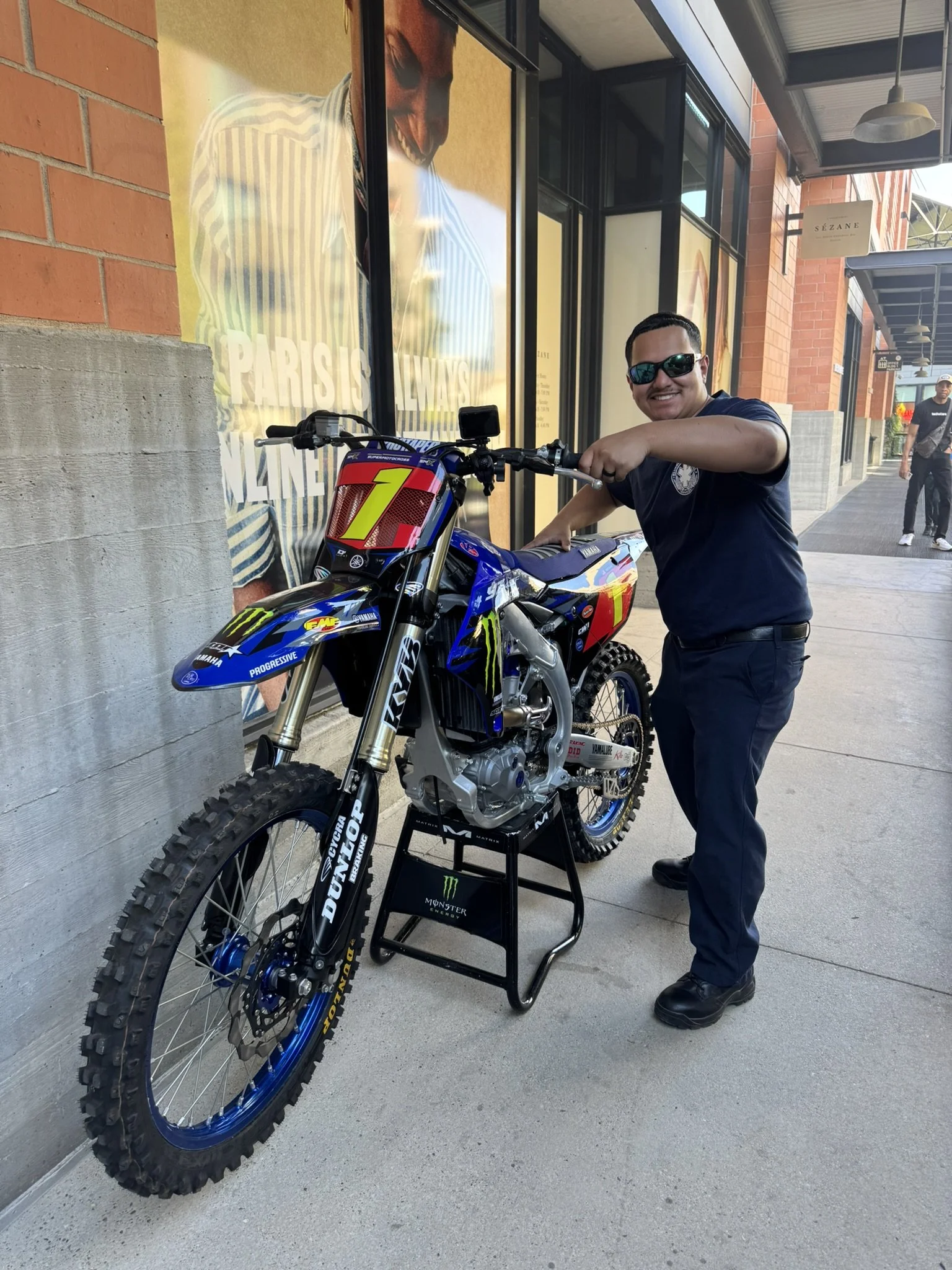 Event medic providing medical standby for Monster Energy and Lando Norris stunt activation in Texas