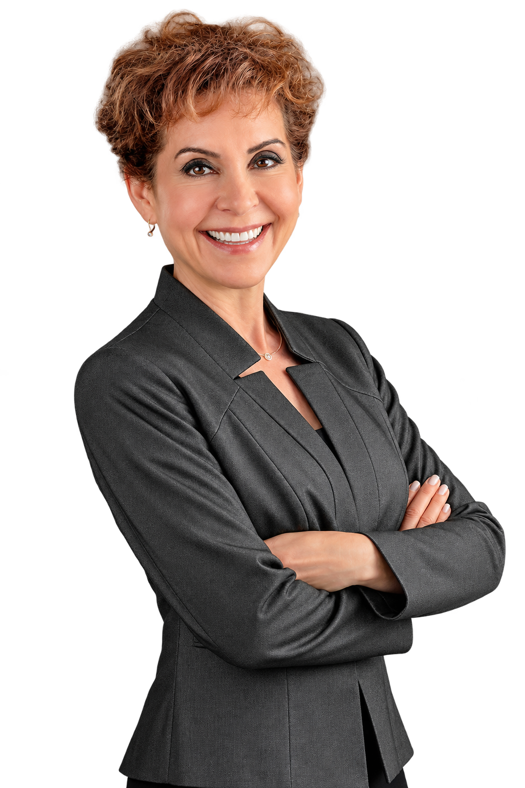 A confident woman with short, curly hair smiling, wearing a dark professional blazer with arms crossed.