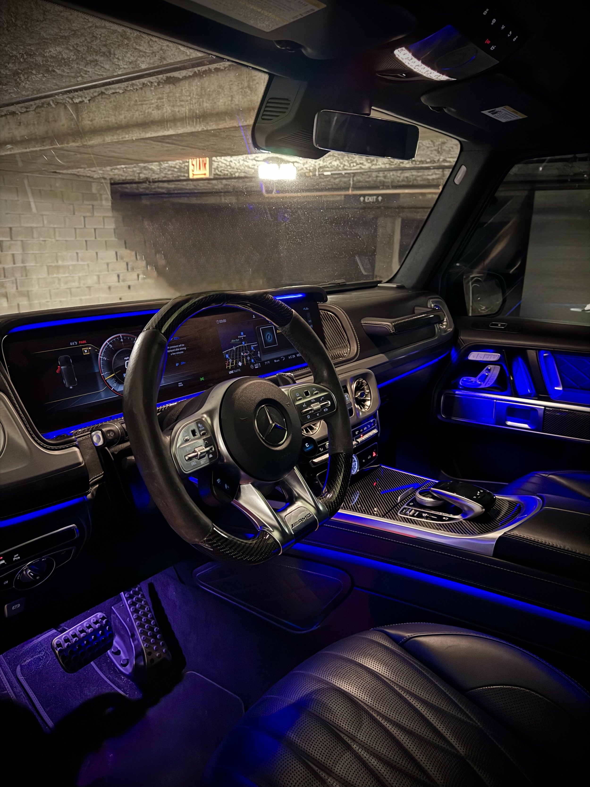 White Mercedes-AMG G63 with black interior, luxury SUV available for rental from Axel Luxury in Chicago.