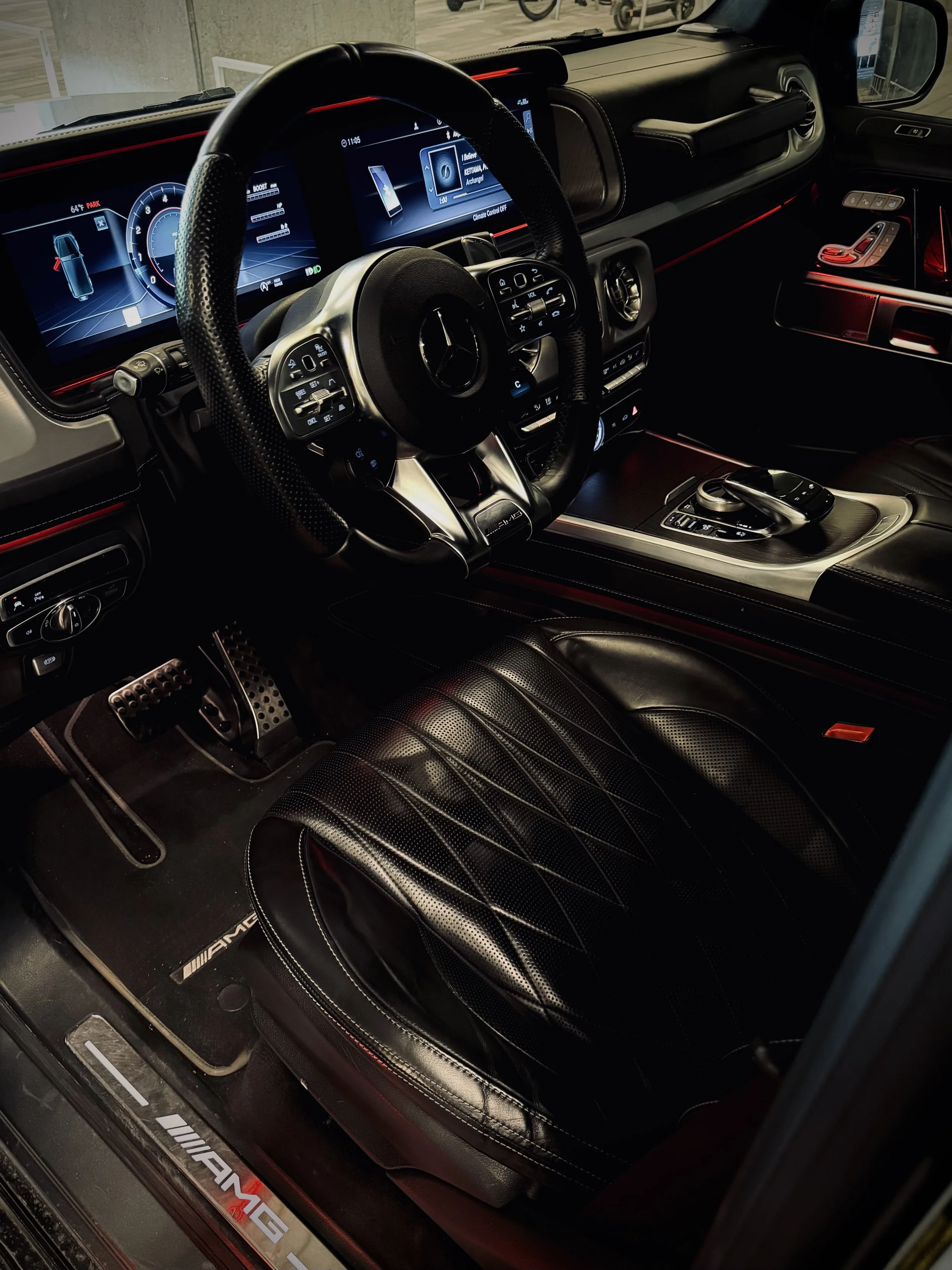 Graphite Metallic Gray Mercedes-Benz G63 AMG luxury SUV parked in Chicago available for rental through Axel Luxury.