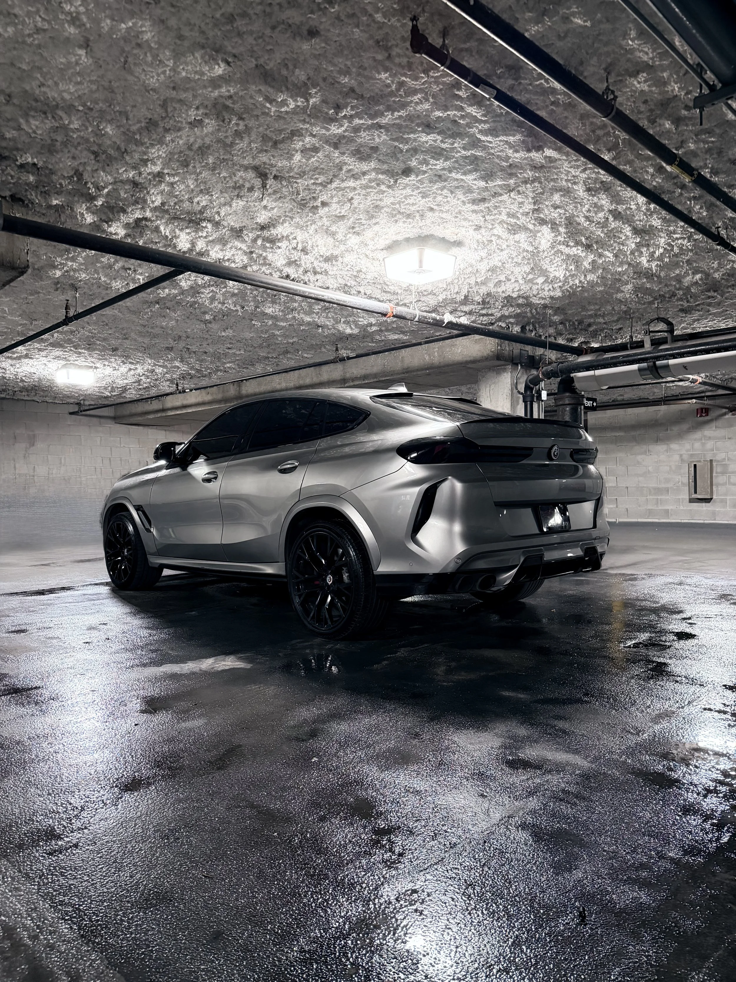 BMW X6 M Competition metallic silver luxury performance SUV with red leather interior