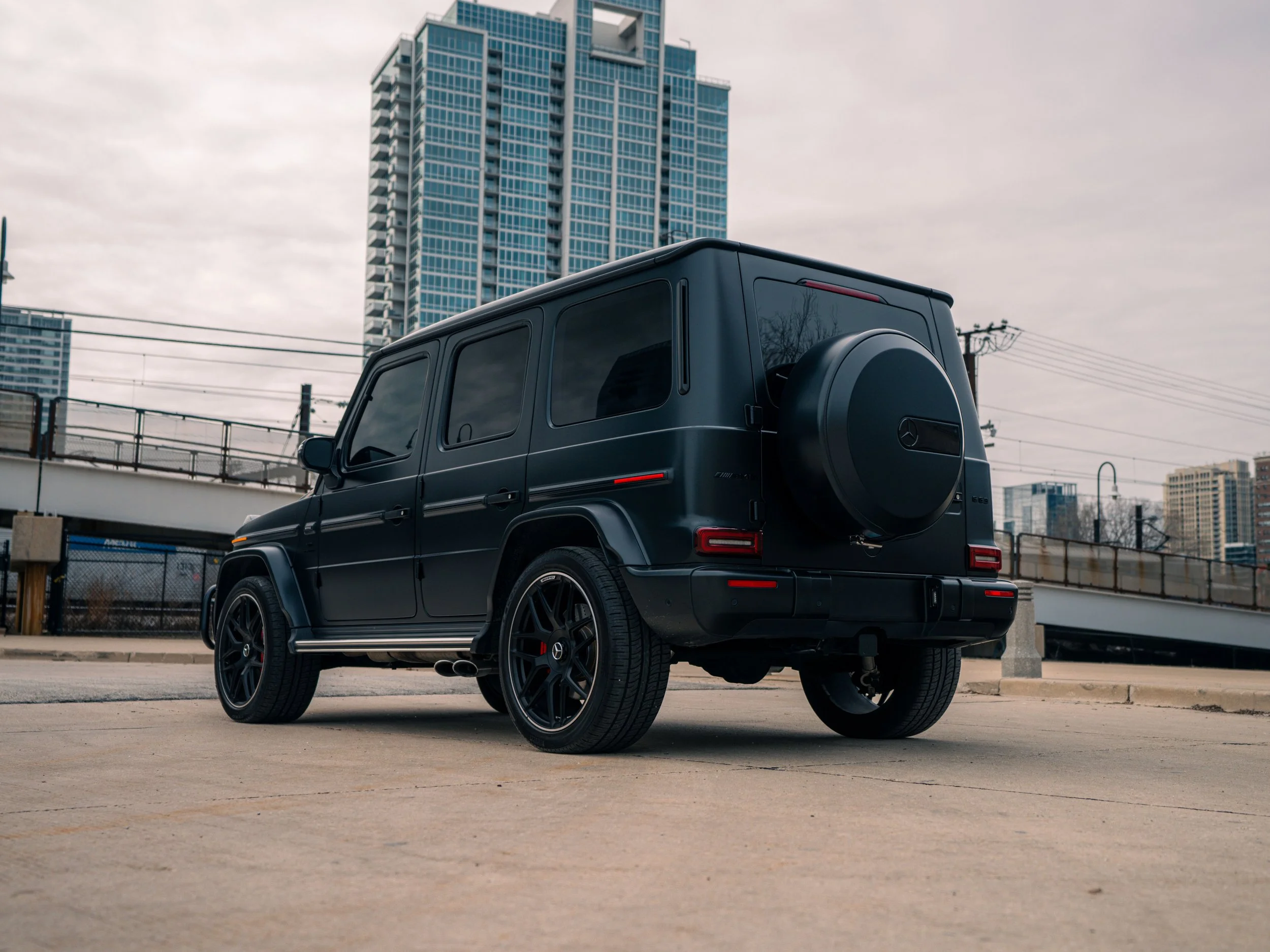 Matte black Mercedes-Benz AMG G63 with red leather interior luxury SUV rental in Chicago
