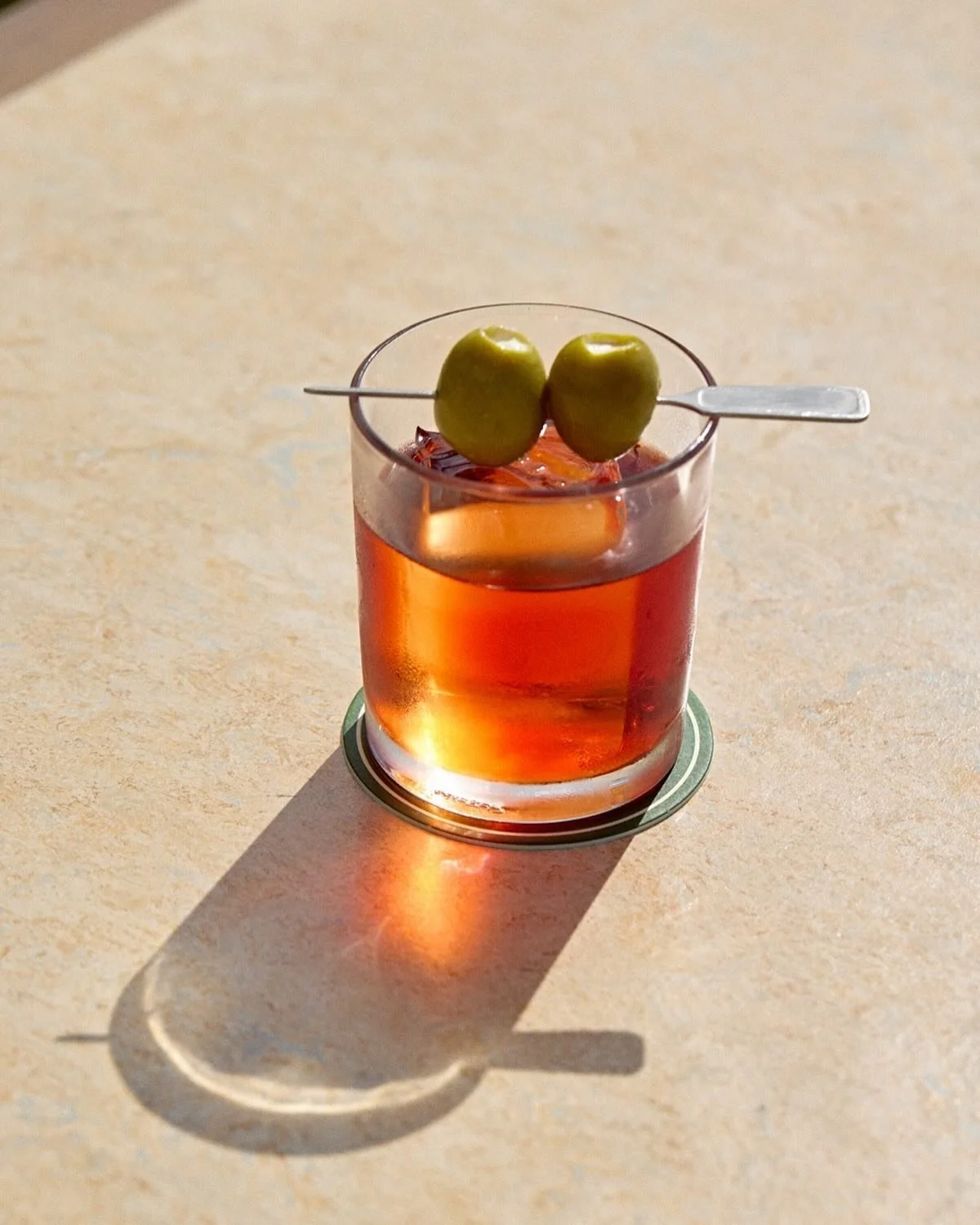 If summer&rsquo;s hanging on, so are we ☀️🍊 Dirty Negronis on the rooftop for your Tuesday!