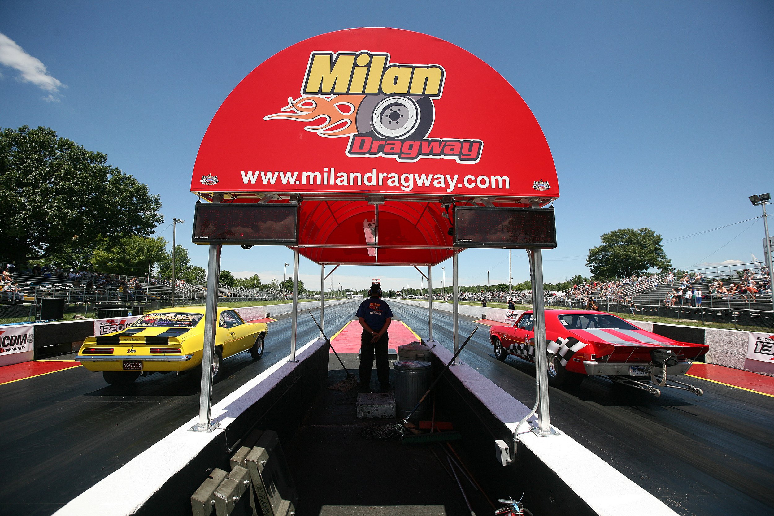 Two cars speed off in a grudge match at the Milan Dragway in Milan Friday, July 04, 2008.