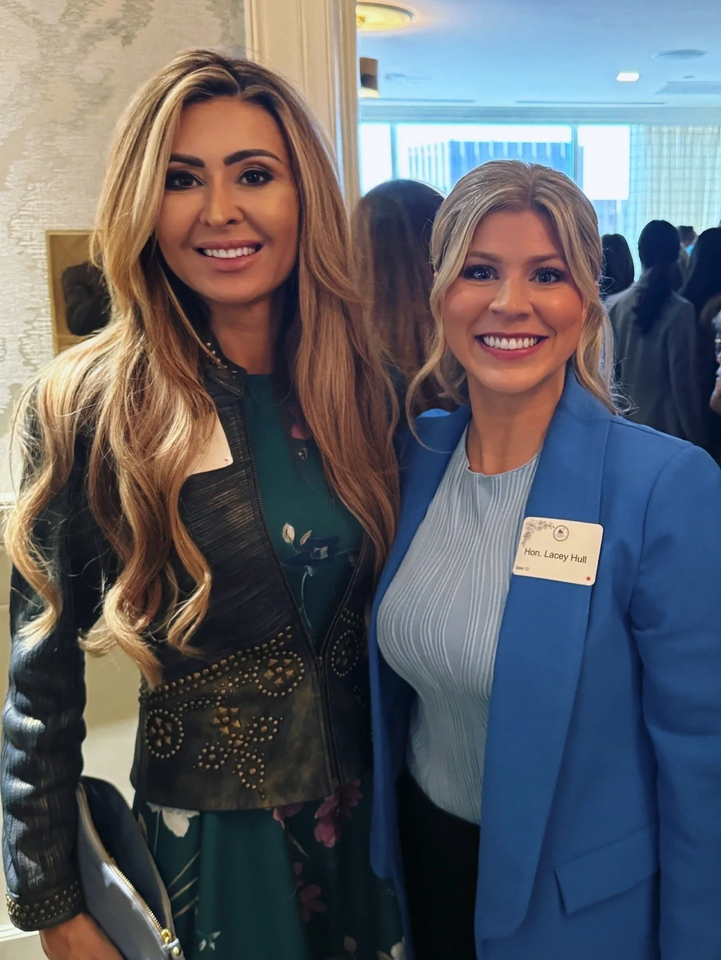 Cat Parks and State Representative Lacey Hull celebrate with the Magic Circle Republican Women in downtown Houston.
