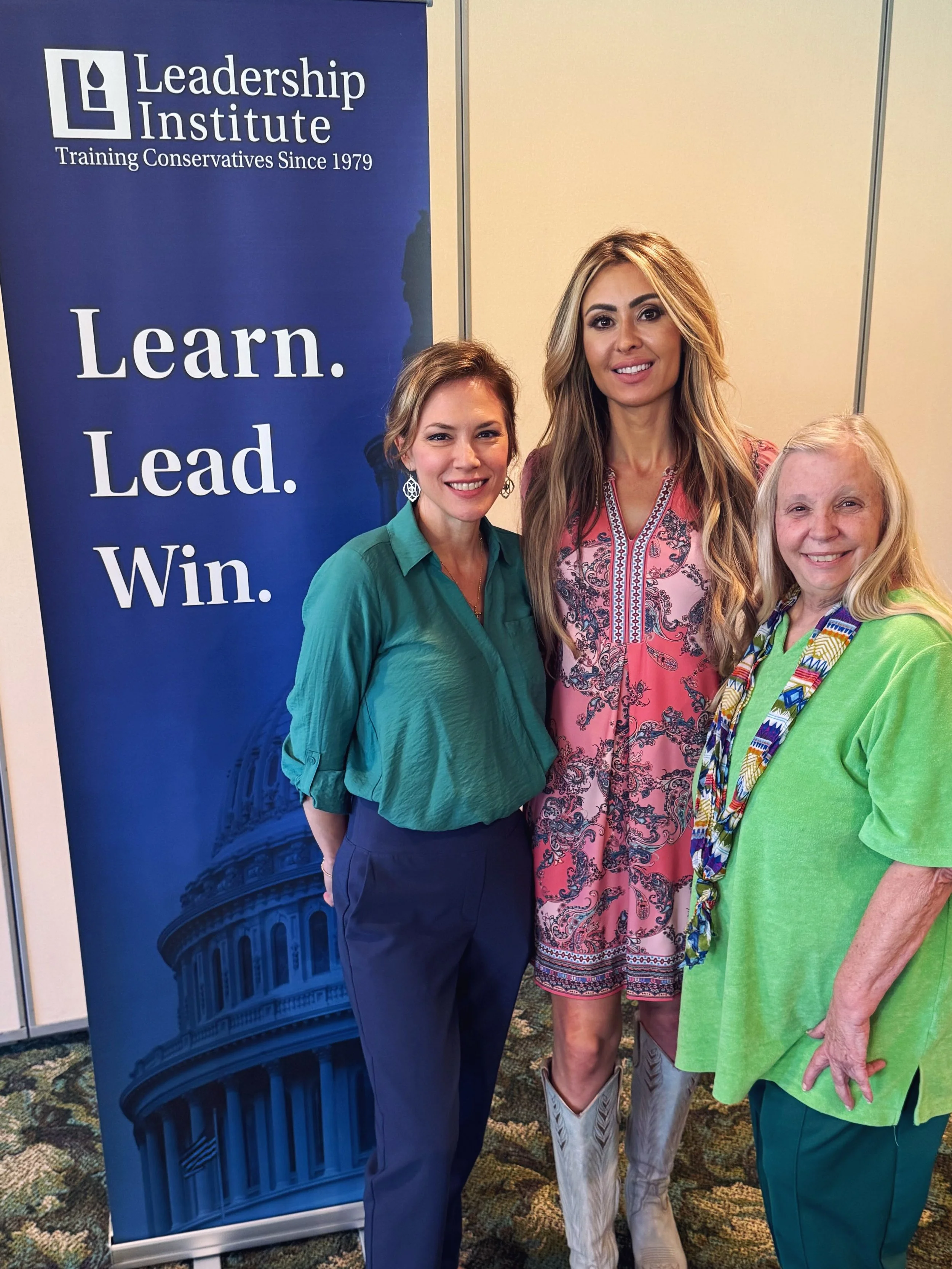 Cat Parks joins Chairman Gwen Withrow and Stephanie Cox at the Montgomery County Leadership Institute training taught by Parks.