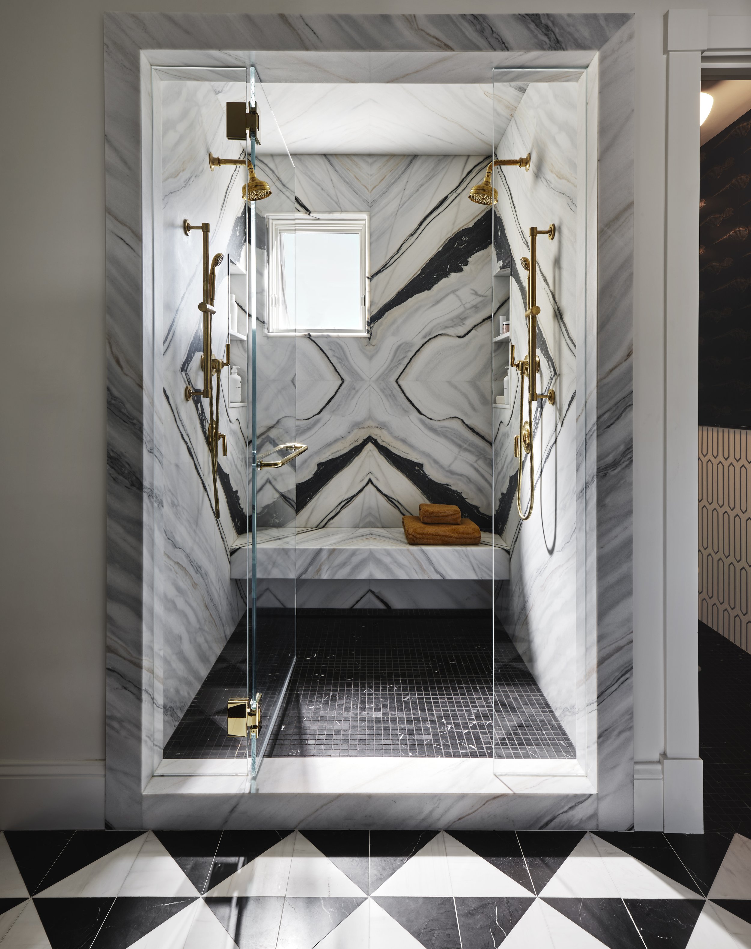 Primary marble bathroom in San Francisco home designed by Eva Bradley Studio with natural stone, Calacatta Macchia Vecchia marble.