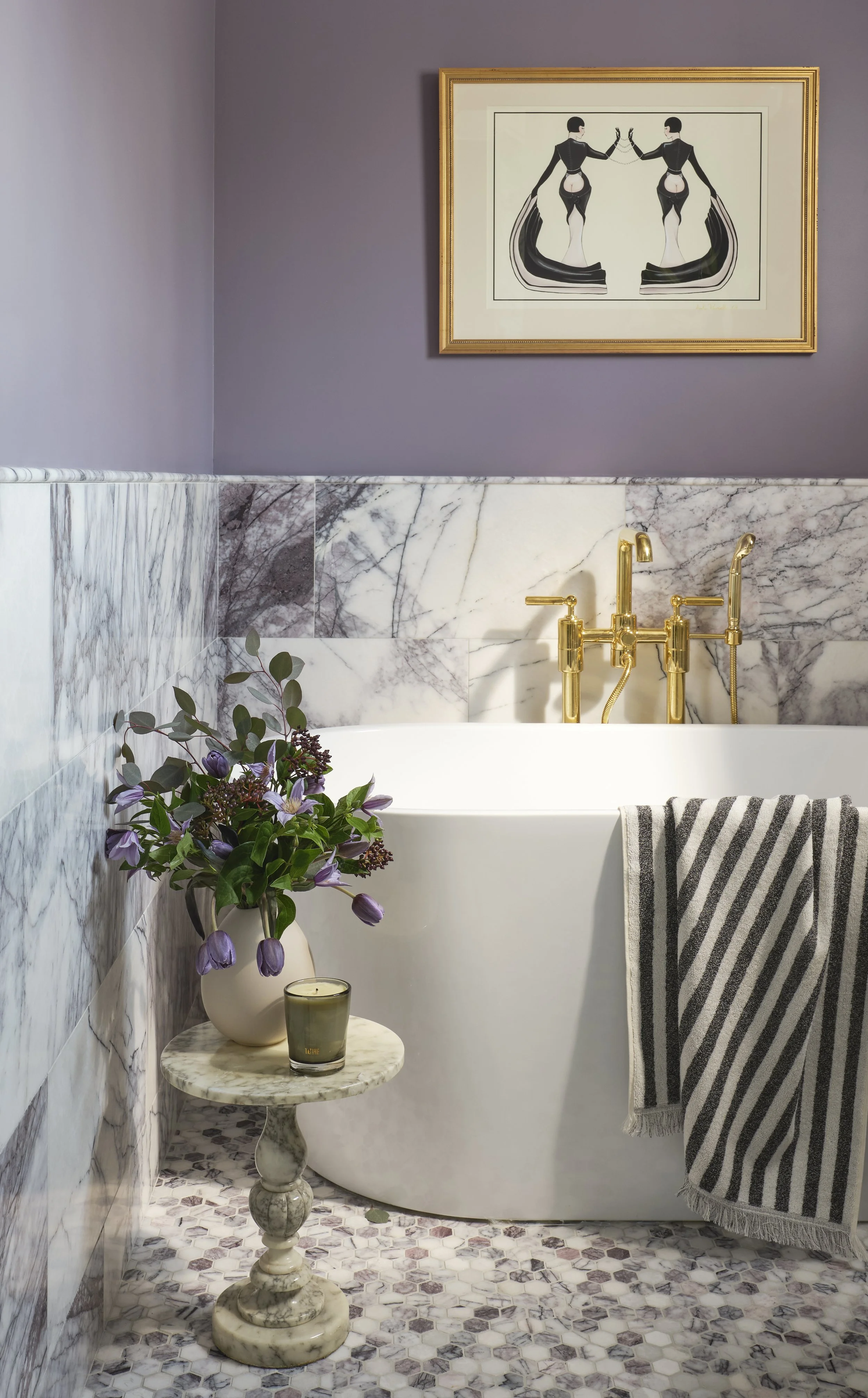 Guest bathroom in San Francisco residence by Eva Bradley Studio with marble finishes and elegant contemporary fixtures