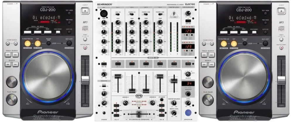 Entry-level DJ setup featuring Pioneer CDJ-200s and Behringer mixer for digital mixing