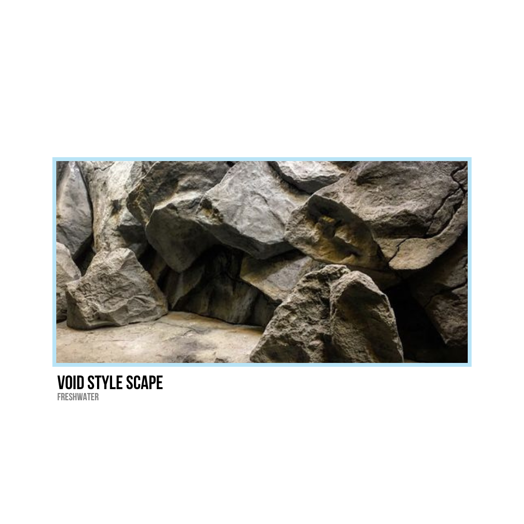 A collection of large rocks with a ground surface, resembling a rocky landscape or cave.