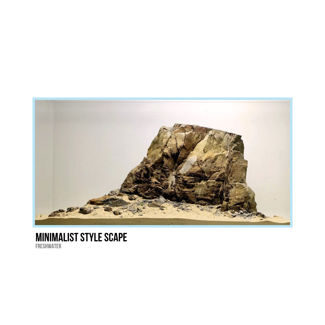 Minimalist rock sculpture on sand with white background, titled 'Minimalist Style Scape' by Freshwater.