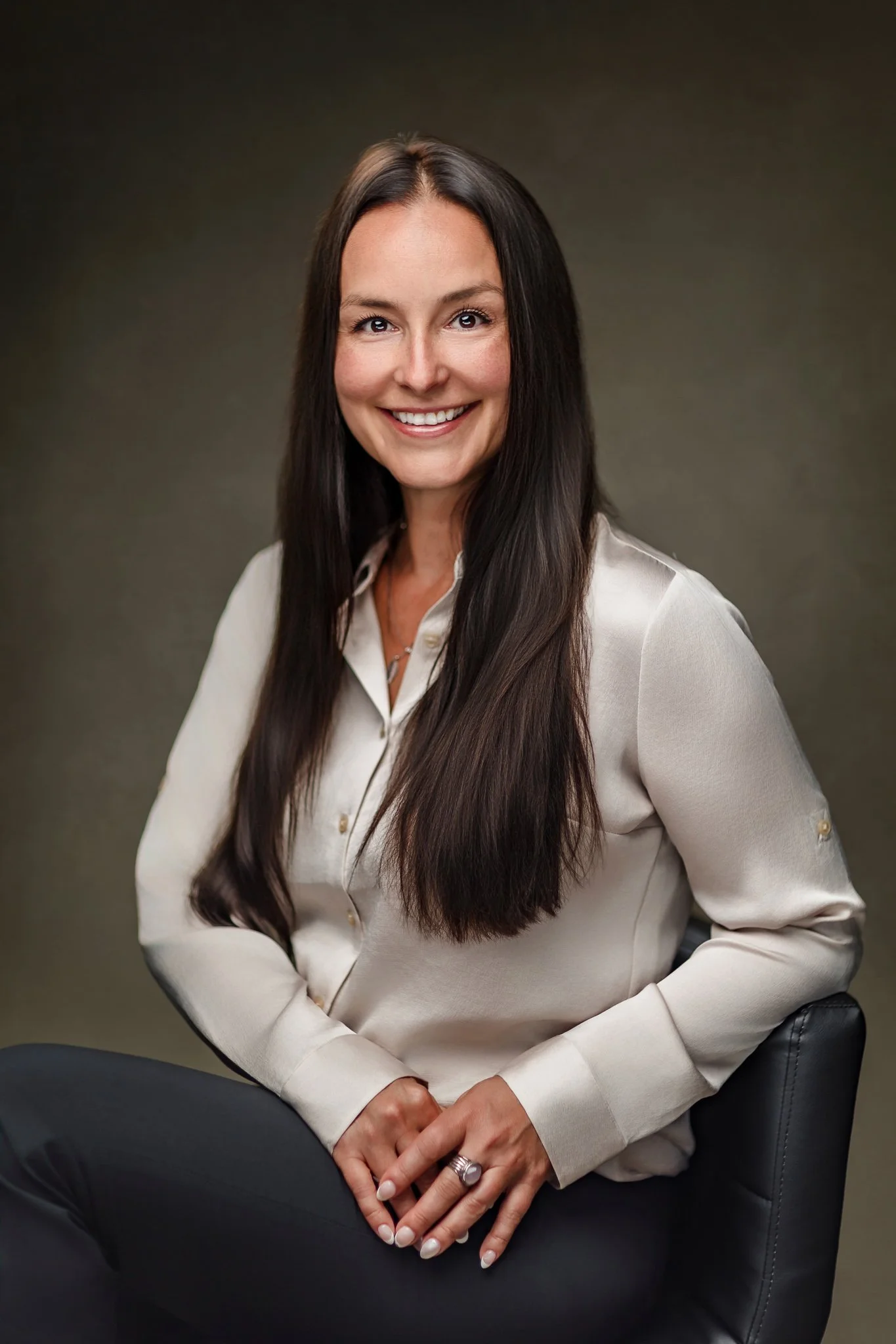 Female headshot brunette long hair white shirt.jpg