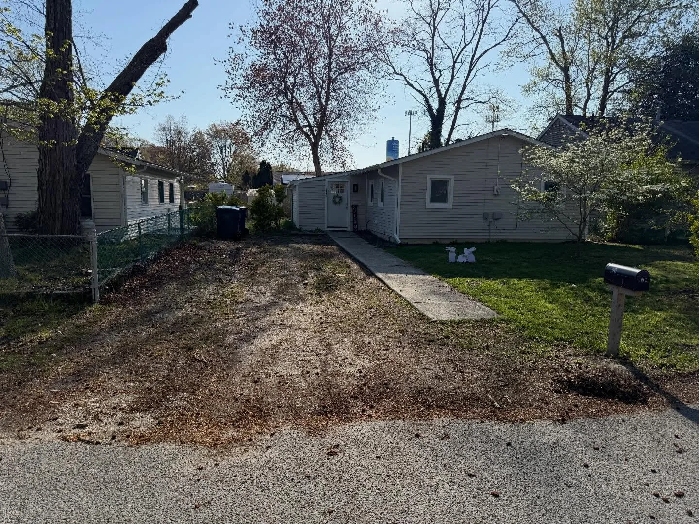 Before and after driveway refresh of 10 tons Artic white stone