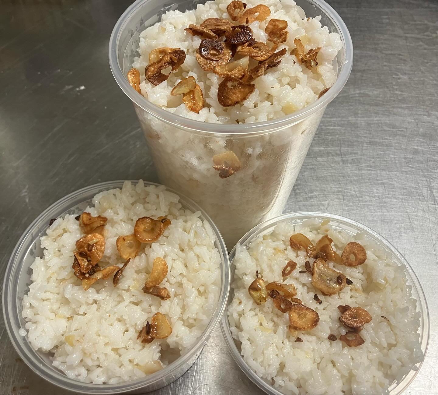 Yesterday&rsquo;s meal: garlic fried rice, smashed cucumber salad, coconut chicken adobo, and mango salad. SO much garlic 😮&zwj;💨🧄!!!