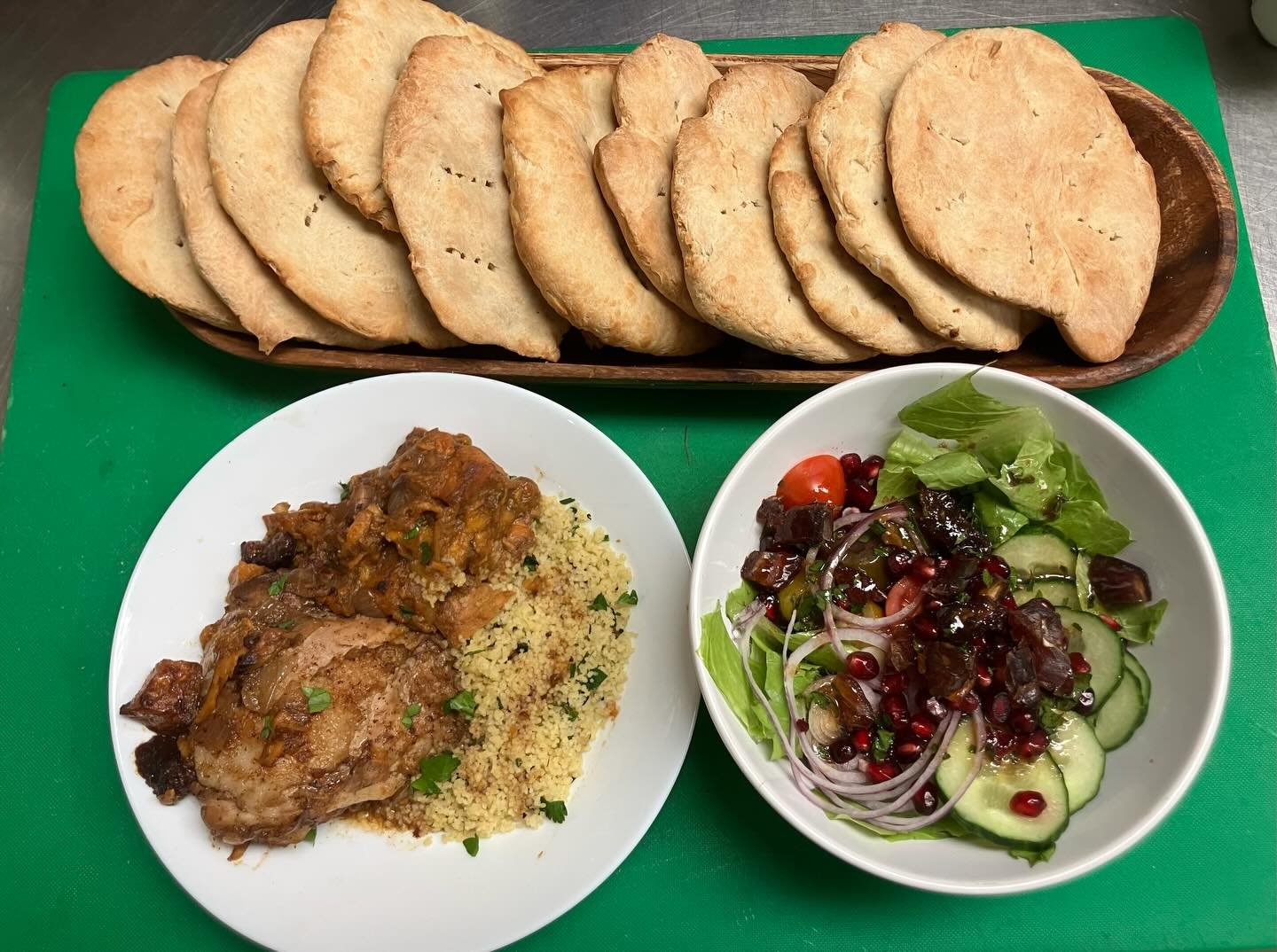 Practicing my food photo skills and enjoying this week&rsquo;s menu - chicken or sweet potato/butternut tagine, lemony herby couscous, salad with dates and pomegranate, and Moroccan flatbreads. Scrumptious!