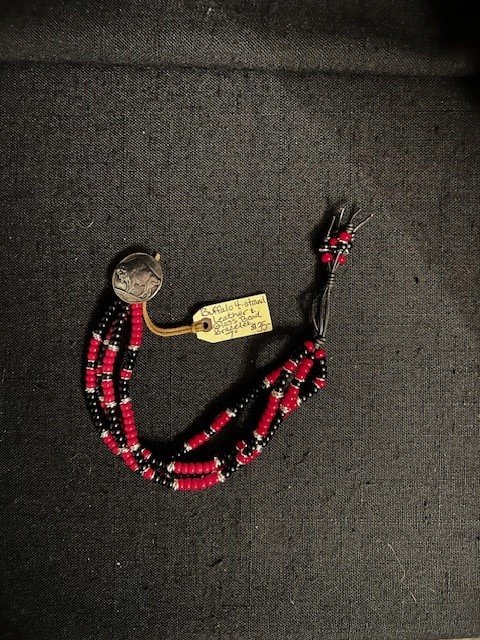 Buffalo 4 strand Glass Czech beads on leather.jpg