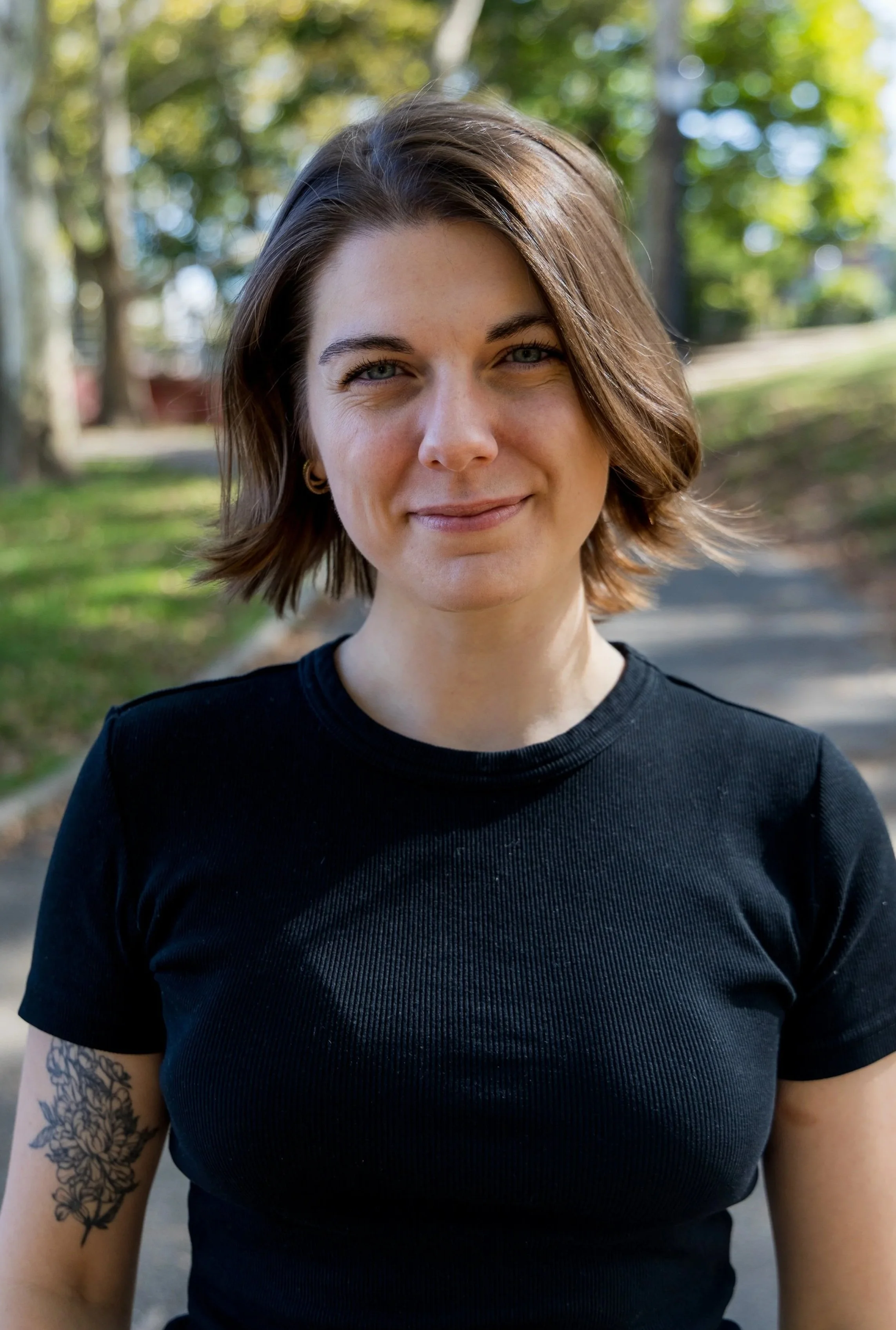 Headshot for Eliza Hill, psychotherapist.