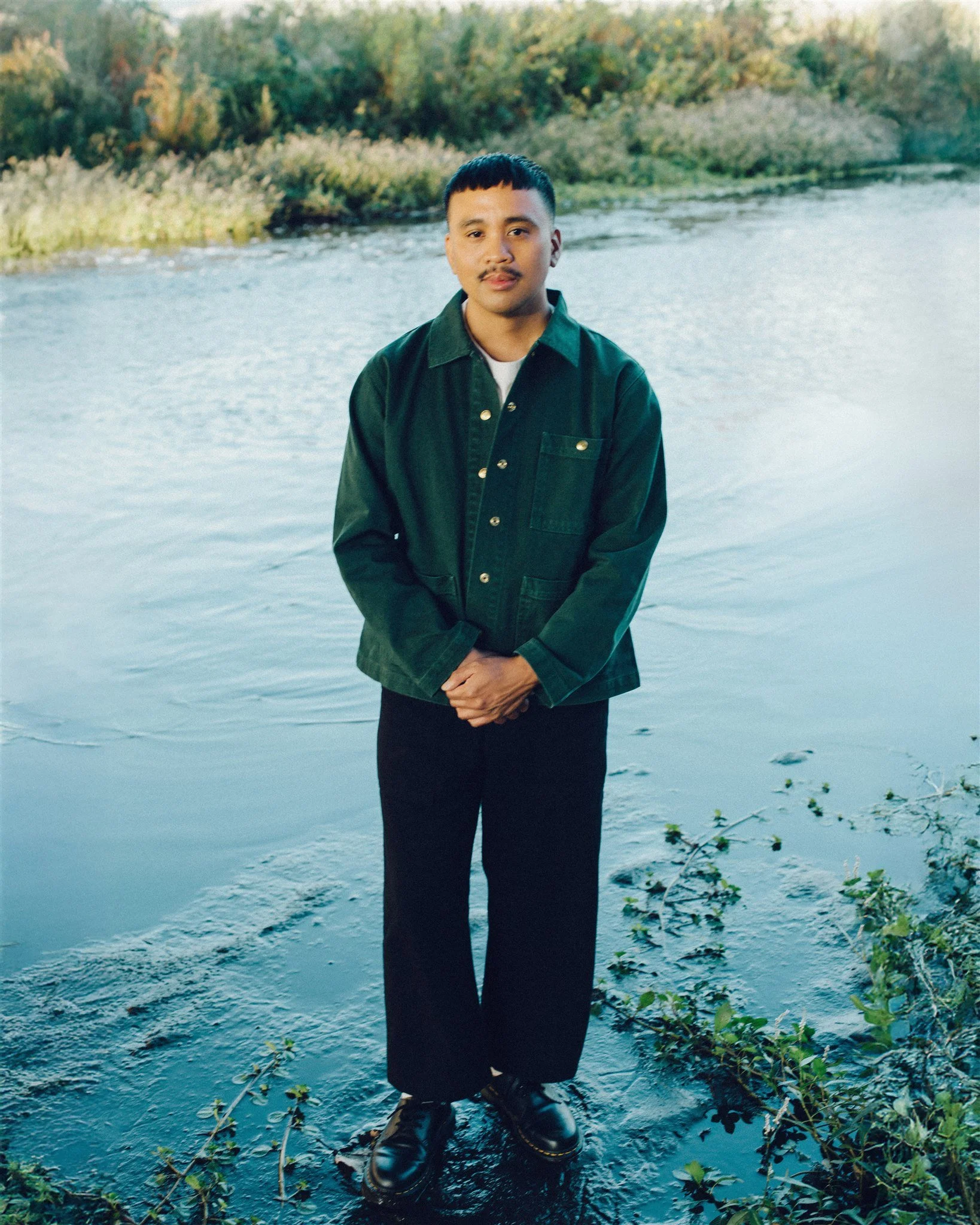 Portrait of Chris Datiles, Los Angeles IFS Therapist, Standing along the LA River