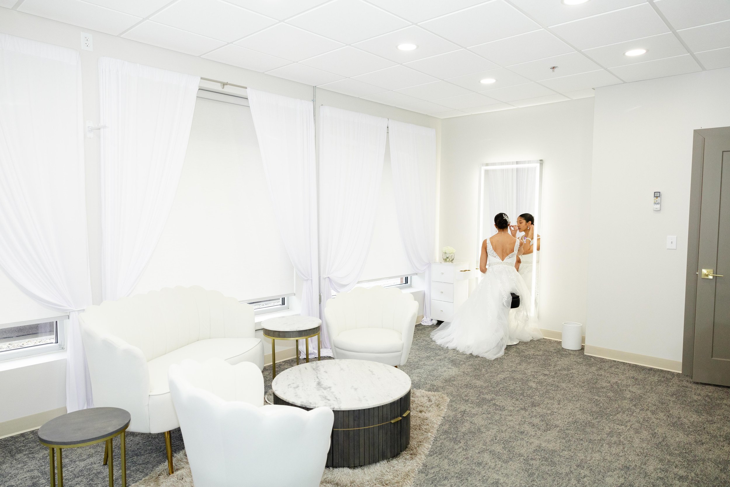 bride in bridal suite back shoot from far away.jpg