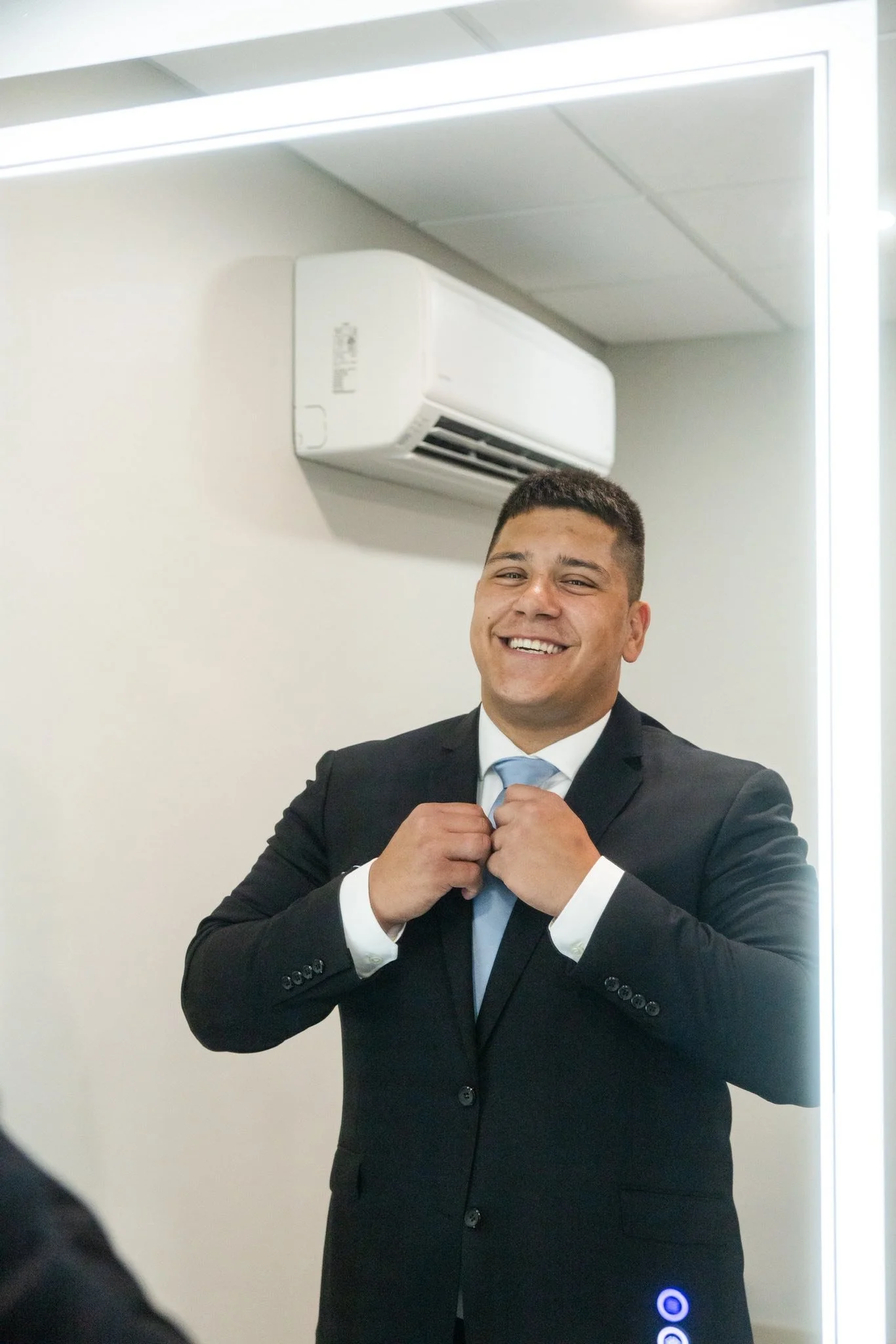 luxefalls-groom-suite-getting-ready-mirror.jpg