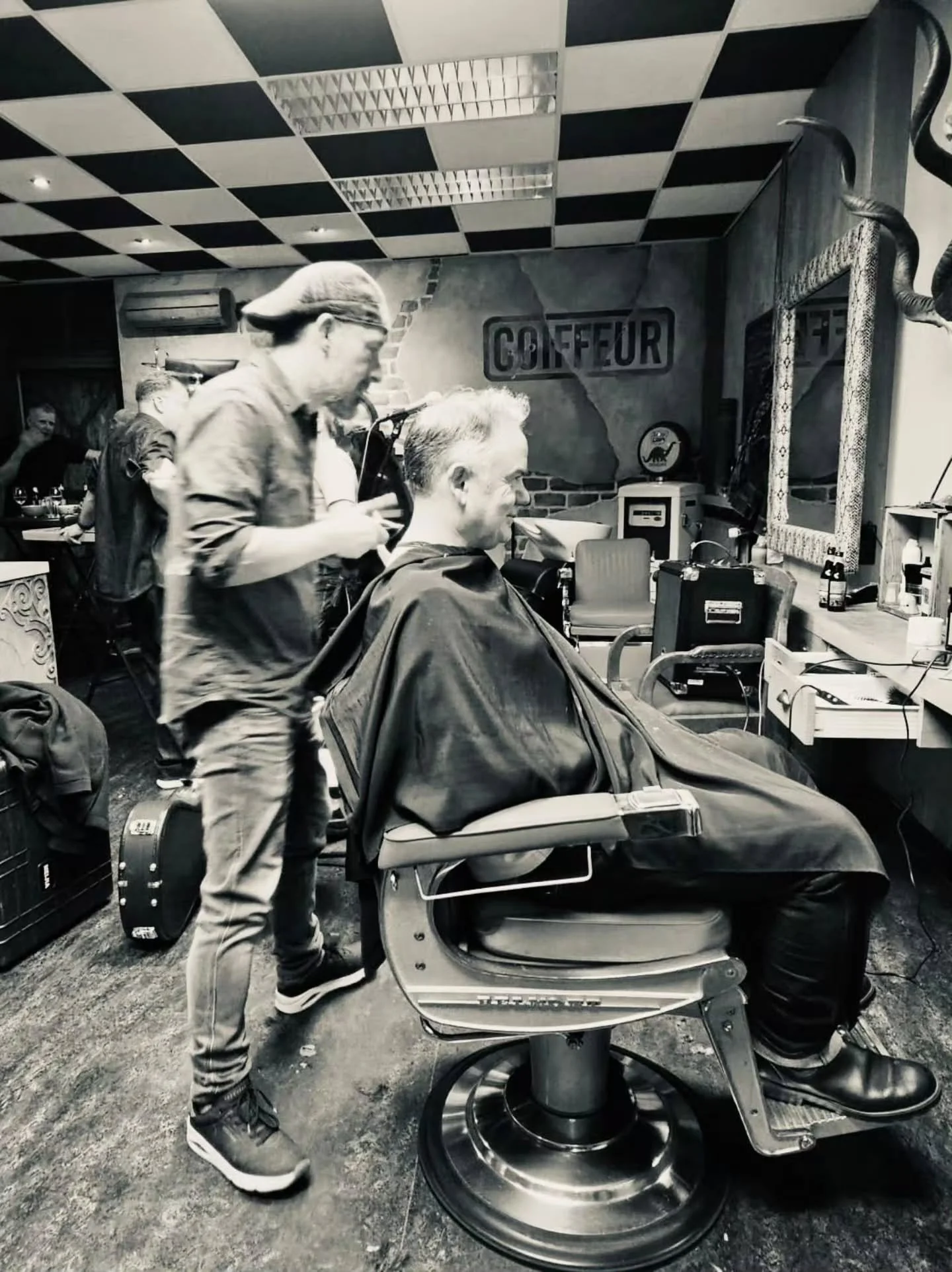 The Haircut 
Andre Hendriks Barber Shop (Herenkapsalon) 
A venue with everything you could wish for 
✂️ 🥃 😍 💀 

Chuck looks pleased - next for the chop? 🤣

#TourDiary