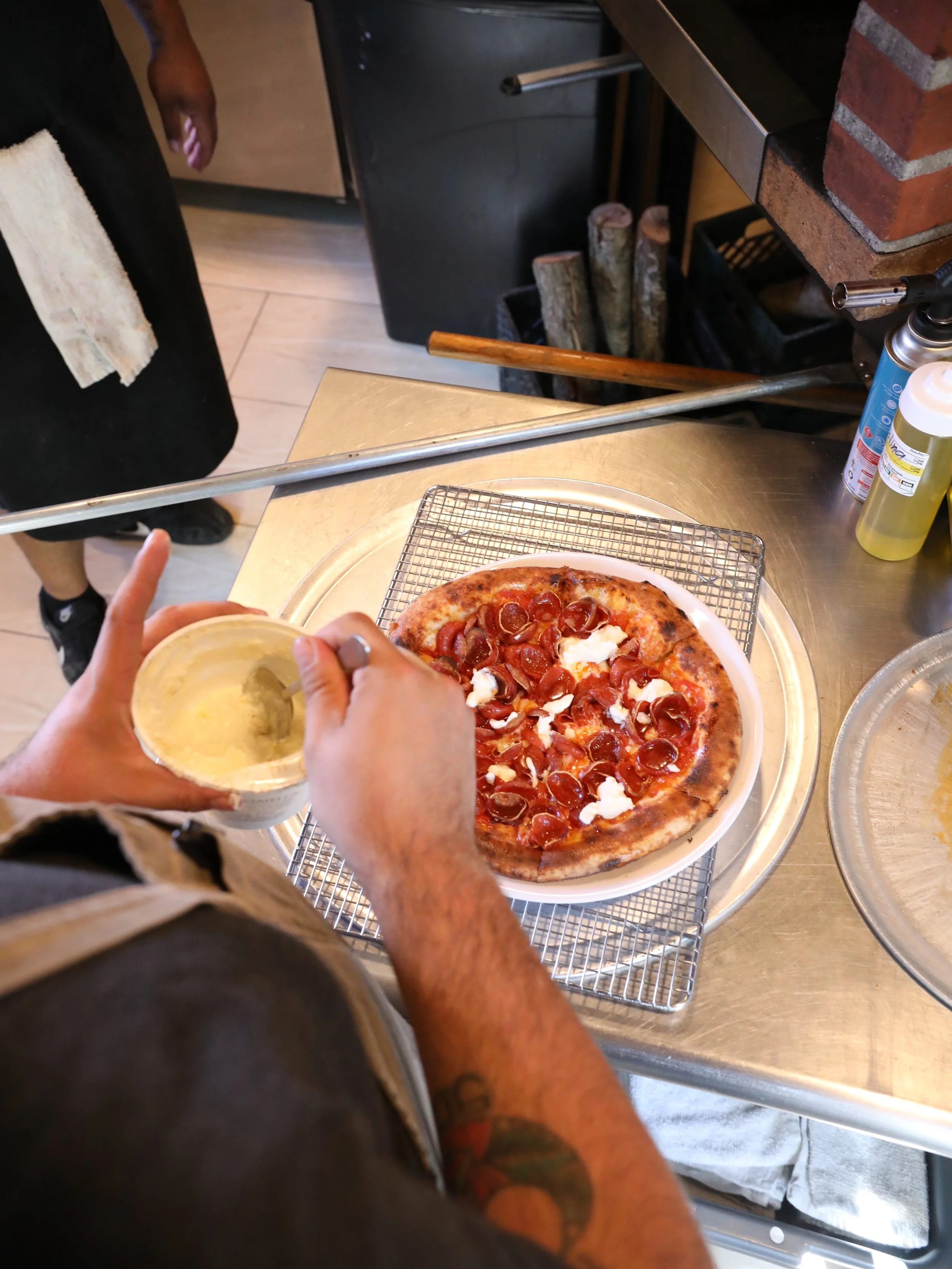 From our CAZ Eats kitchen to your table. A few finishing touches, a quick slice, and lunch tomorrow starts looking a lot like leftover pizza.

Or maybe that&rsquo;s optimistic.

We&rsquo;re open. Come have dinner with us.