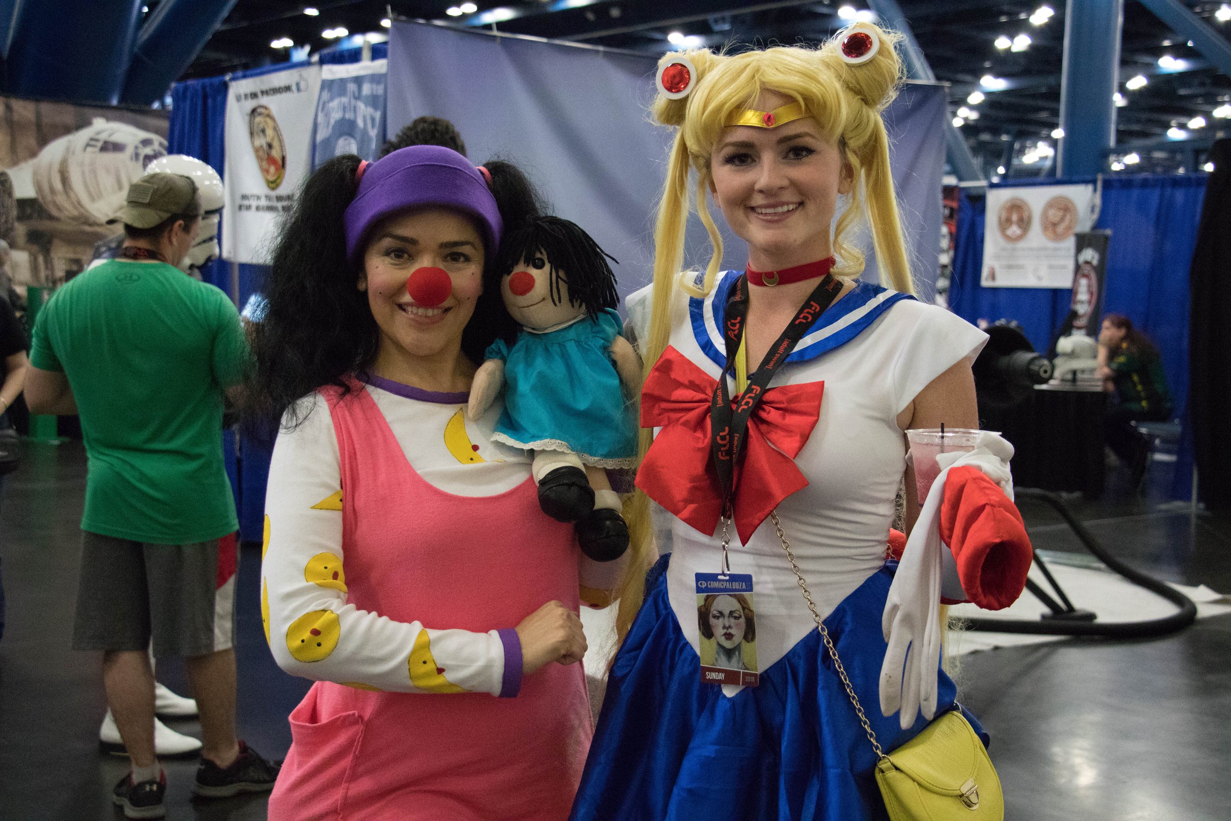 Fans cosplaying as "Sailor Moon" and "Loonette the Clown" from "The Big Comfy Couch".
