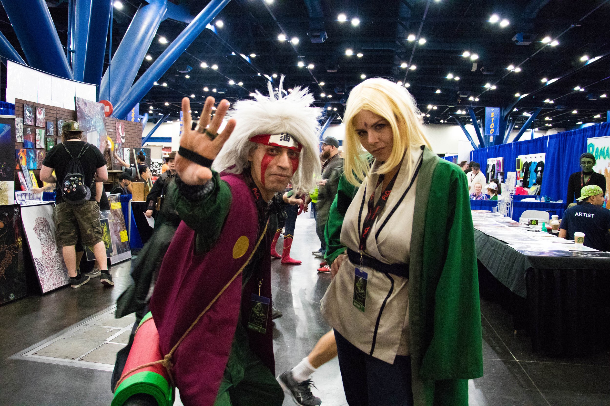 Fans cosplaying as Jiraiya and Tsunade from the popular anime, "Naruto".